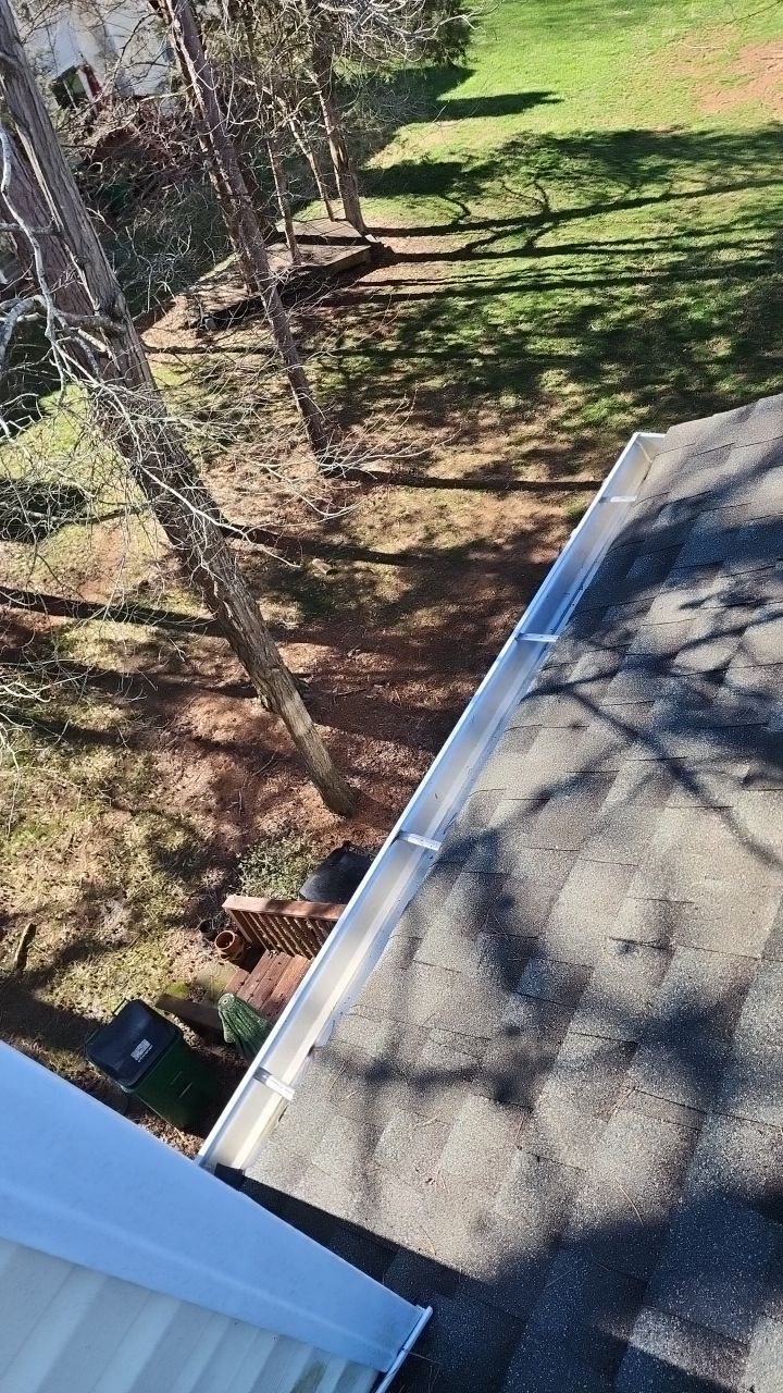Gutter Cleaning using water by Power Wash Masters LLC
