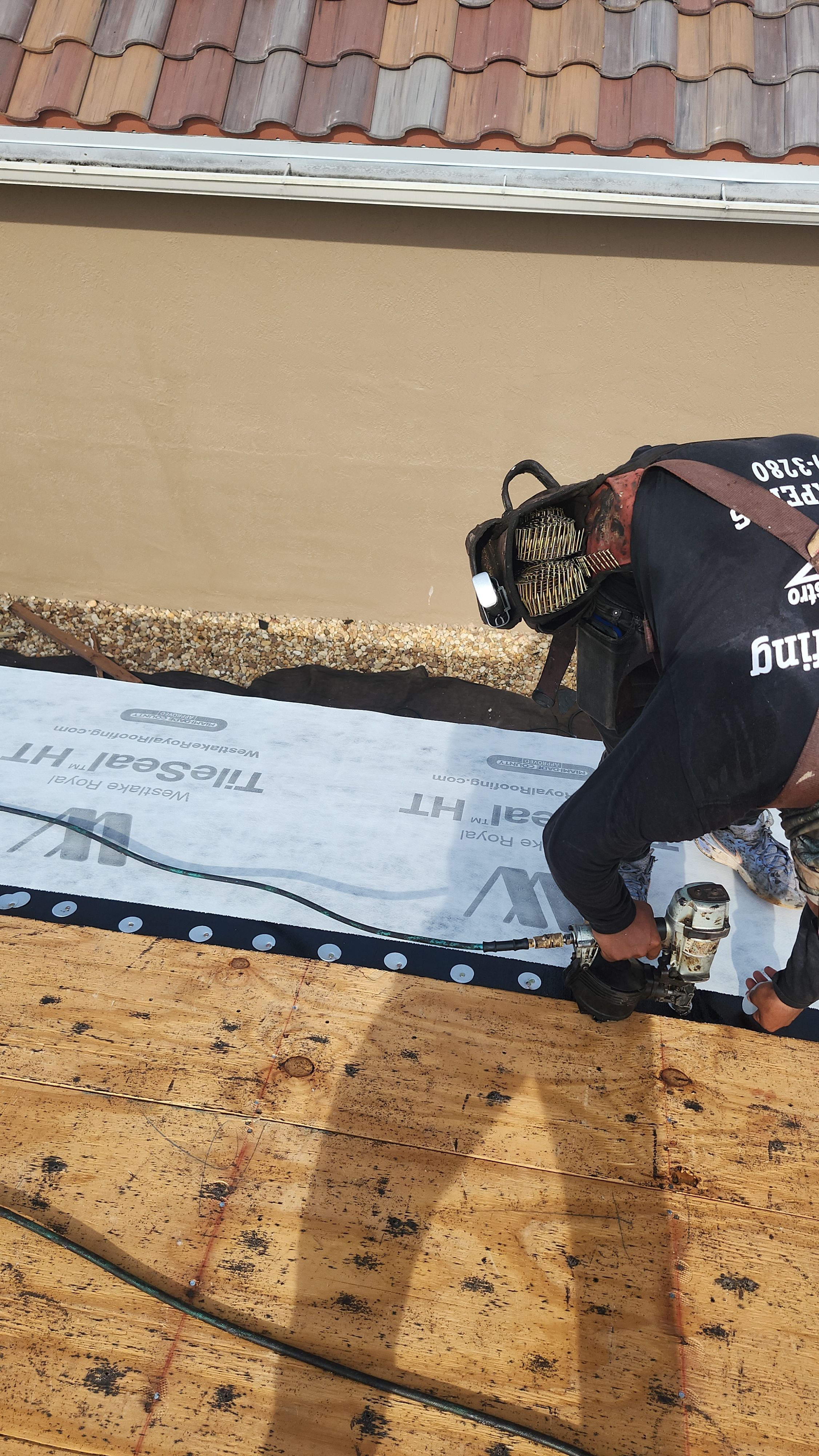 New Barrel Tile Roof Installation and Decking Repair in Boynton Beach by Aastro Roofing