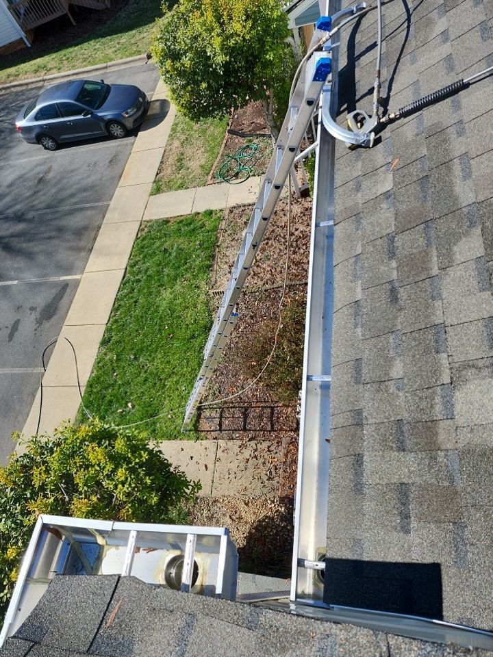 Gutter Cleaning using water by Power Wash Masters LLC