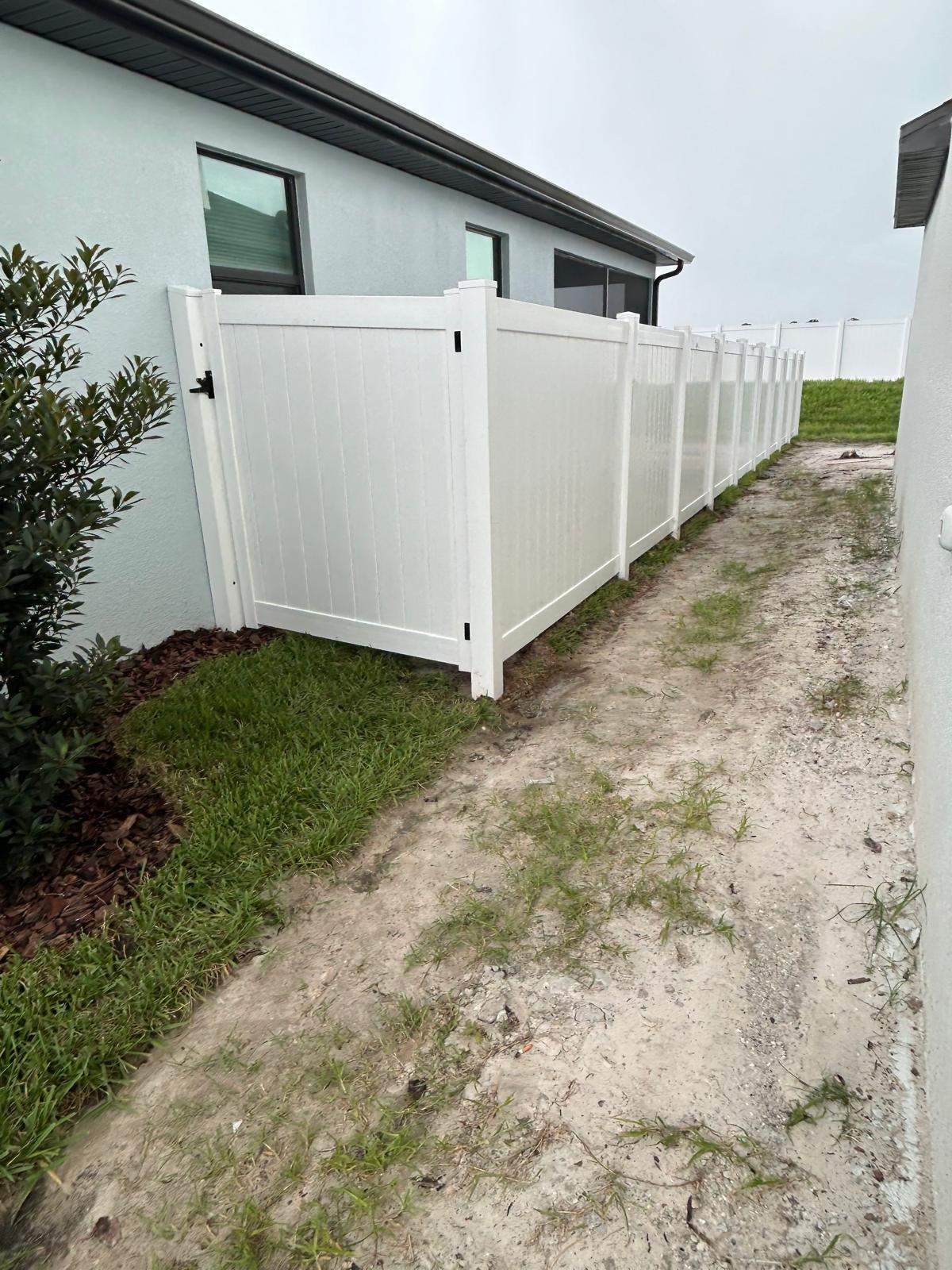 White Vinyl Privacy Fence Installation for North Port Residential Property by True Fence LLC