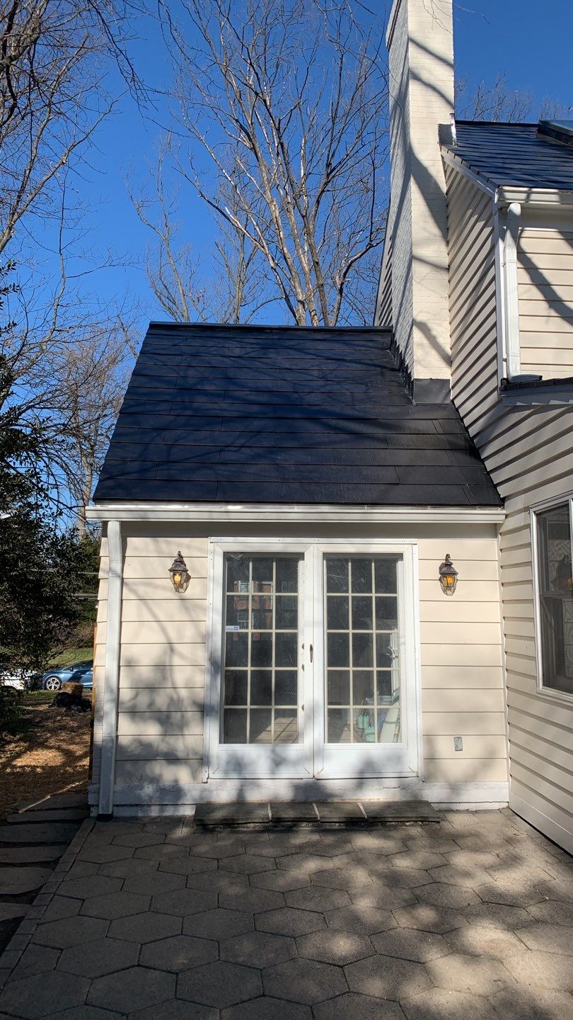 Tesla Solar Roof  by American Home Contractors