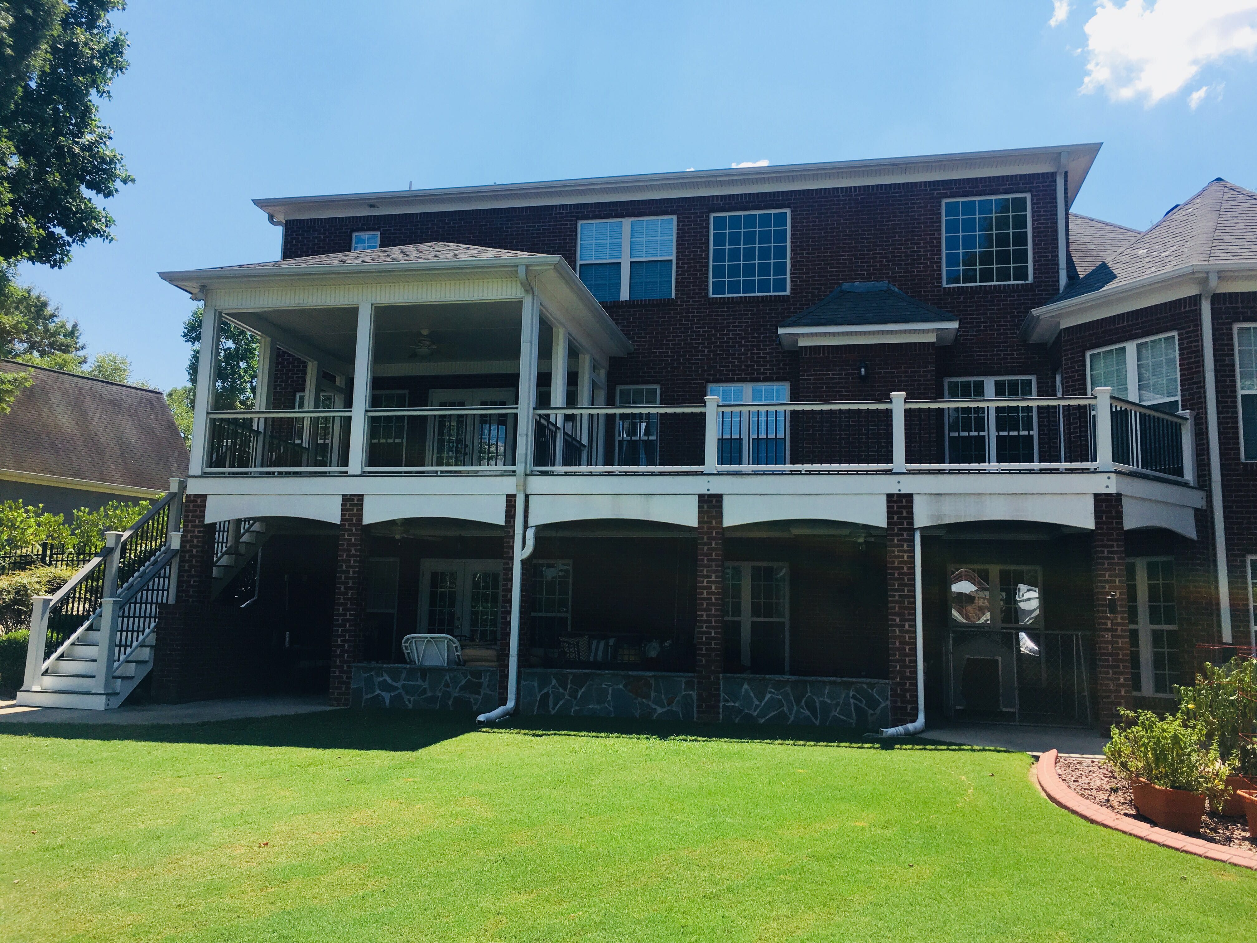 Elevated Composite Deck and Screened Porch Construction in Newnan by Swift Home Renovations