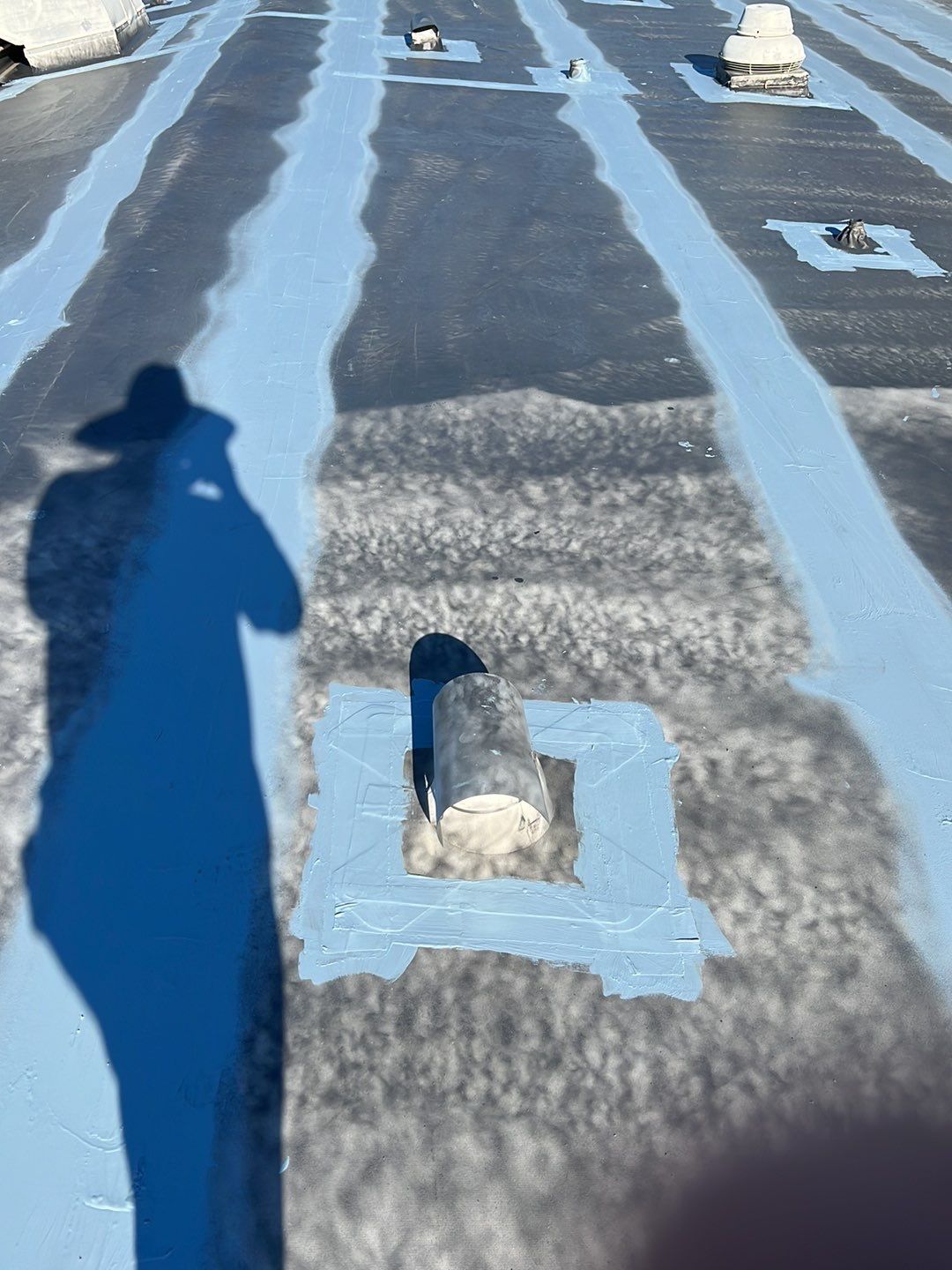 MR Roofing system using Benchmark/PUMA XL coatings over TPO single-ply roofing by Straight Edge Roofing Inc