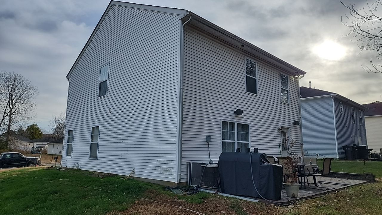House Wash using cleaner by Power Wash Masters LLC