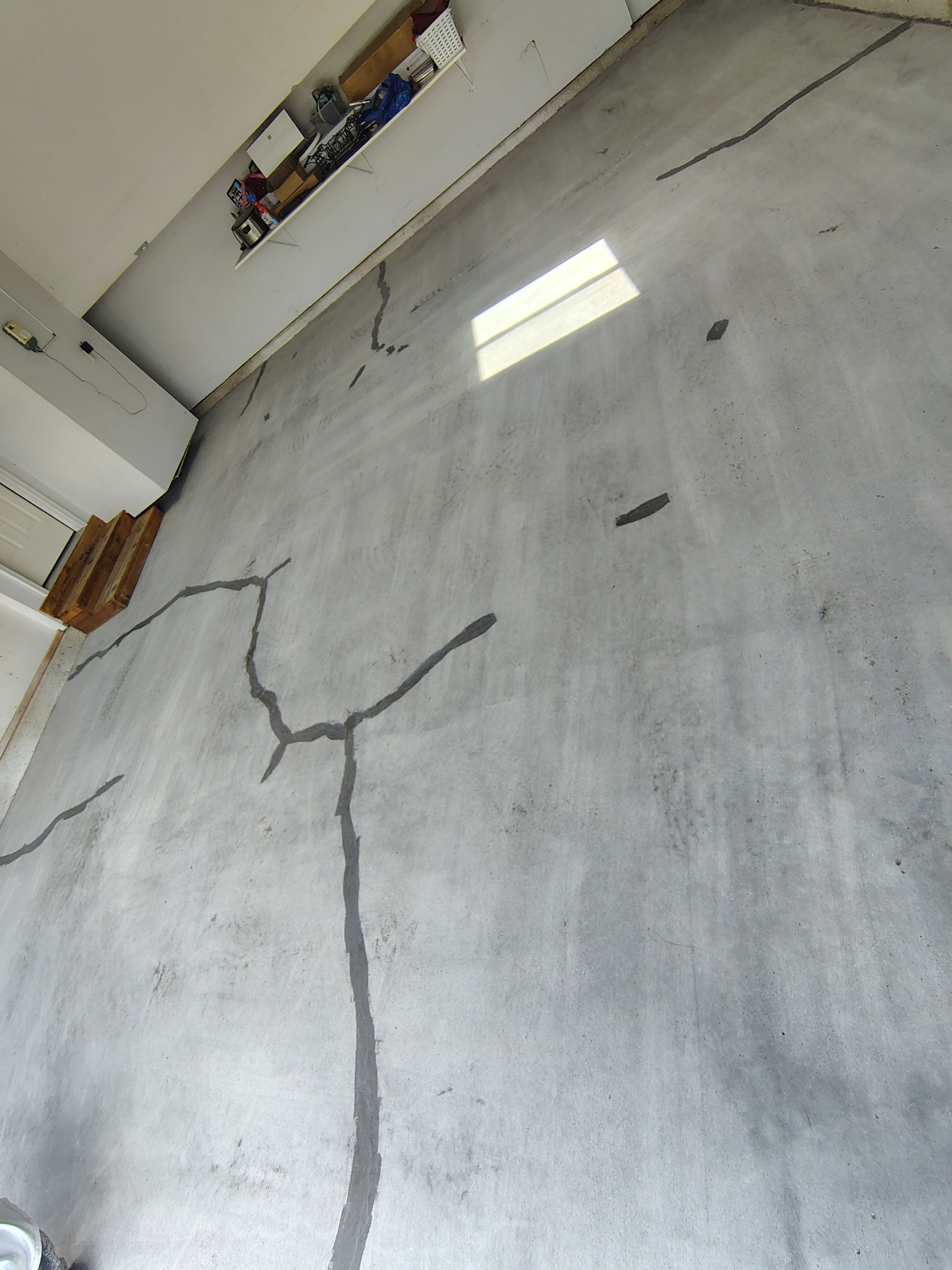Decorative Chip Epoxy Garage Floor Coating in Sioux Falls by Select Painting, Coatings & Garage Cabinets