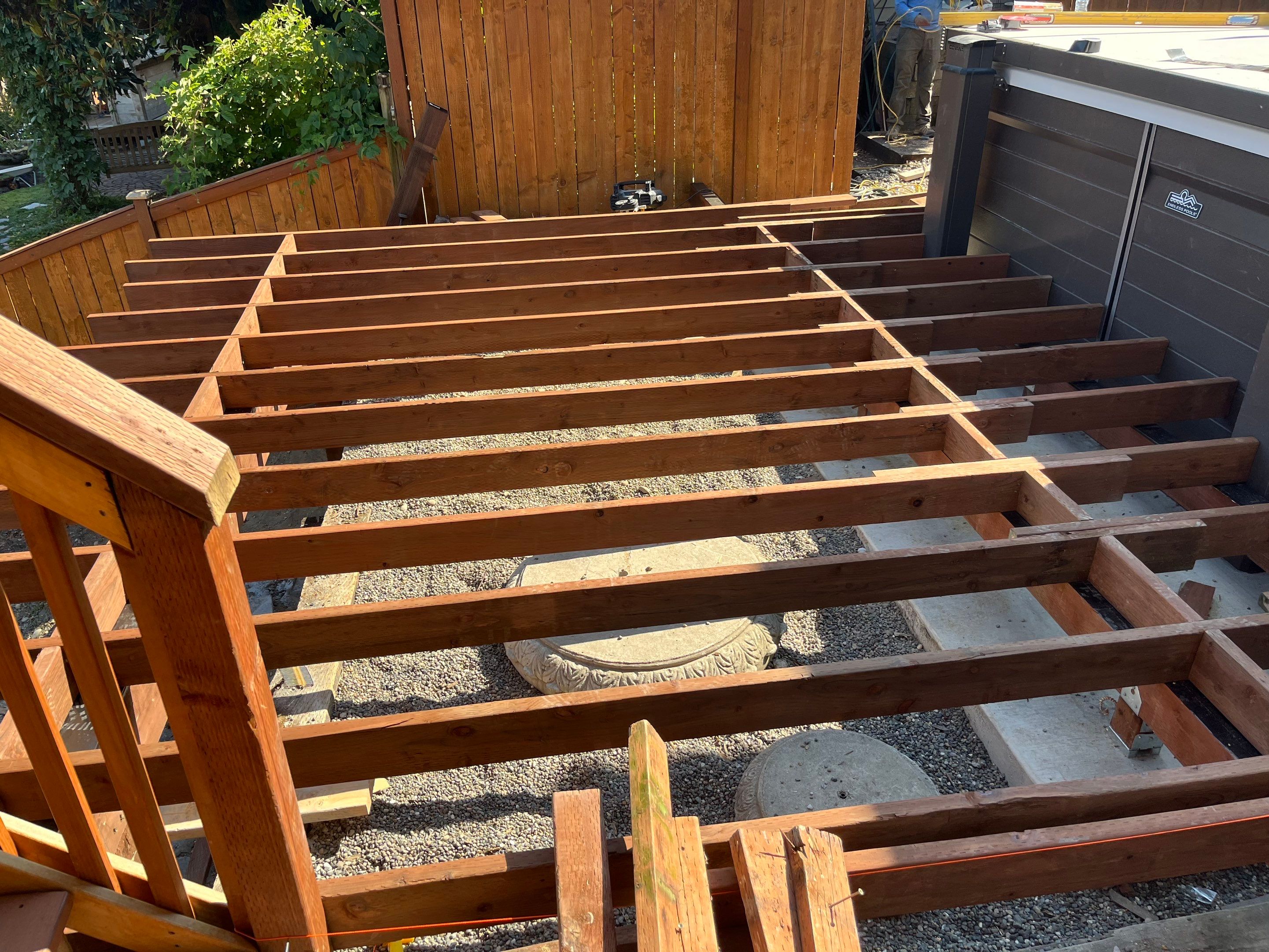 Tacoma Custom Composite Deck and Hot Tub Surround with Retaining Wall by Emerald City Energy 