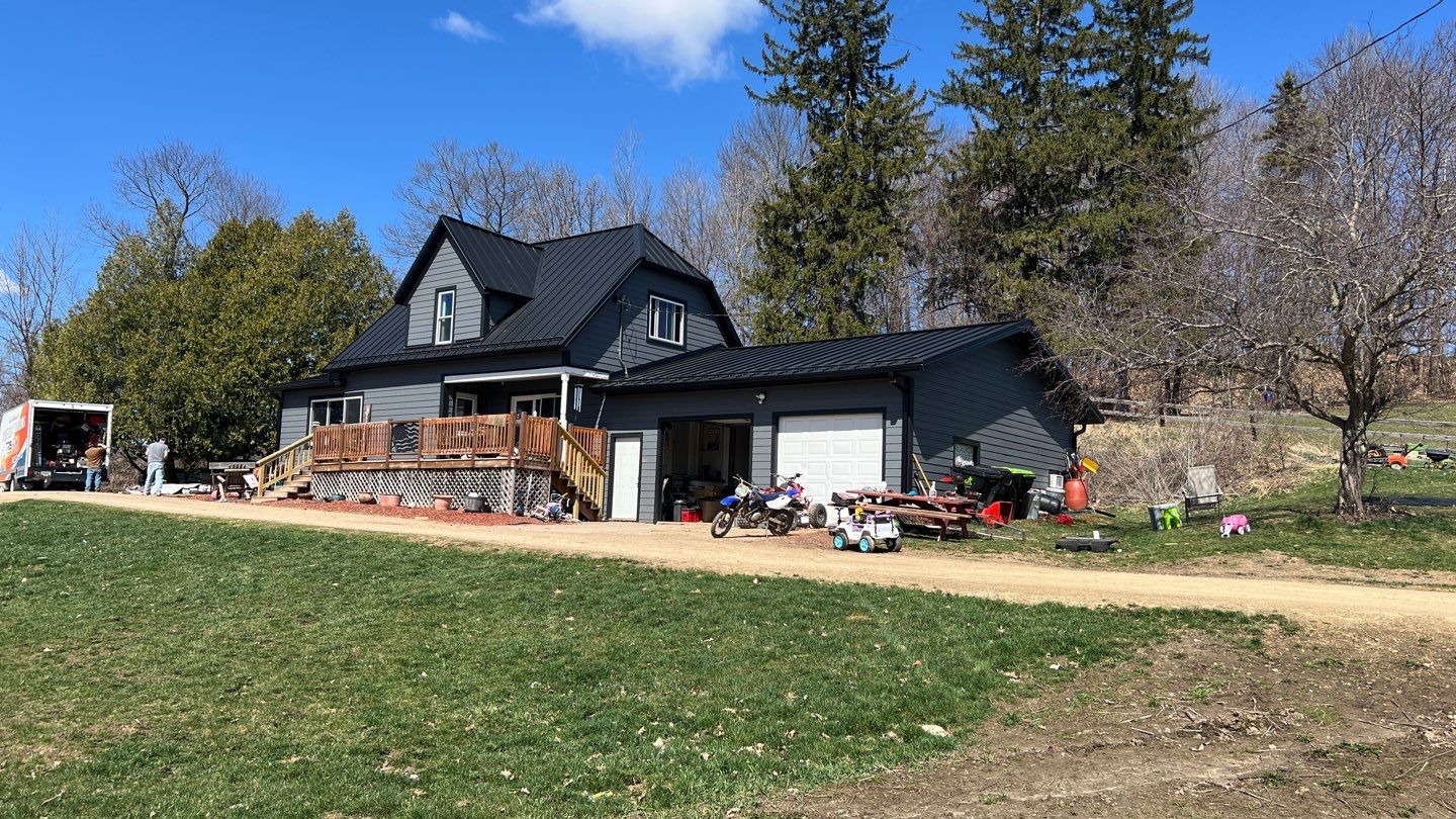  Stunning Home Exterior Makeover | Metal Roofing & LP Smart Siding by Total Restoration Services by LeFever Roofing LLC