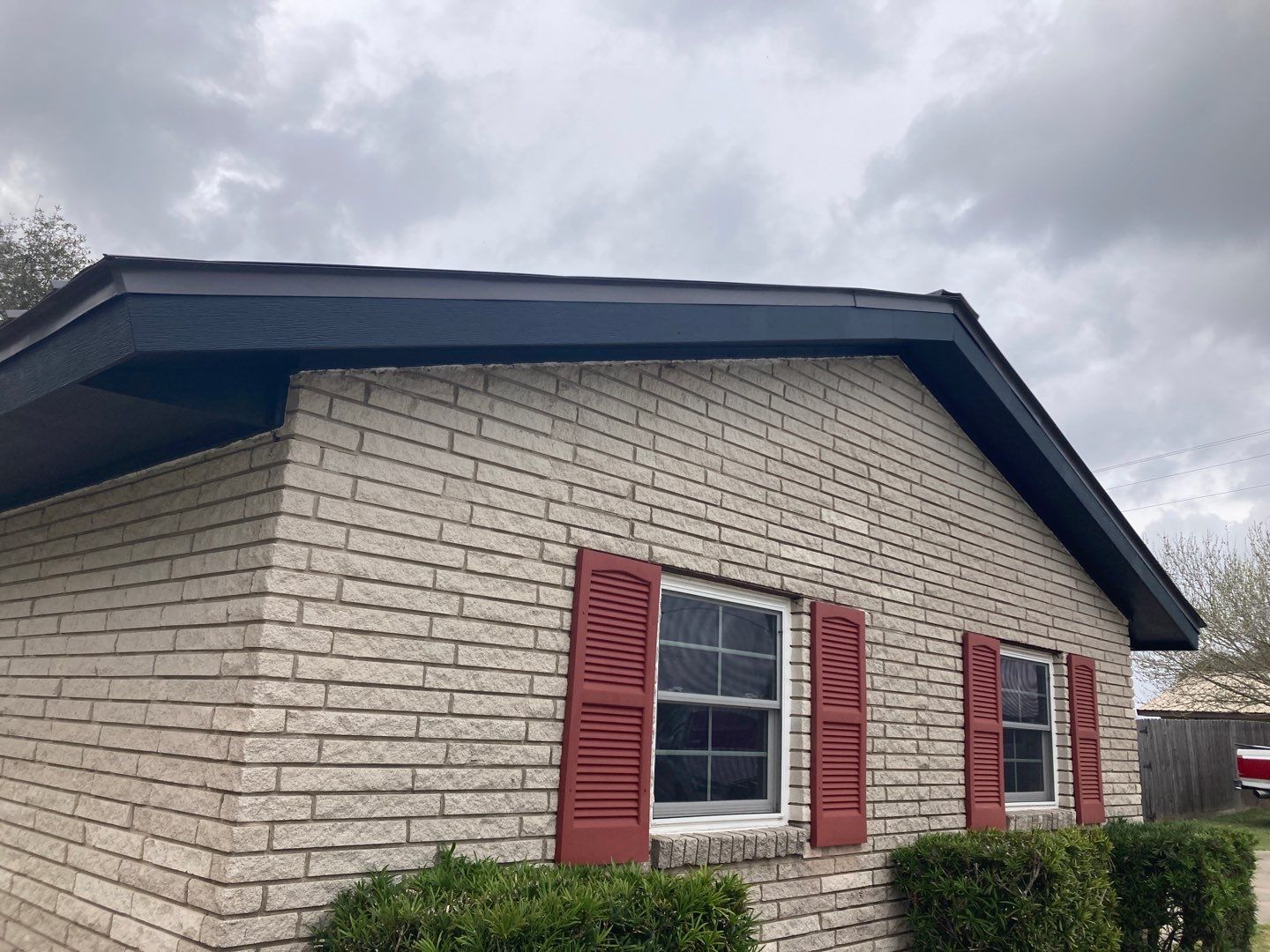 Beeville Backporch sittin' by Bayfront Roofing and Construction