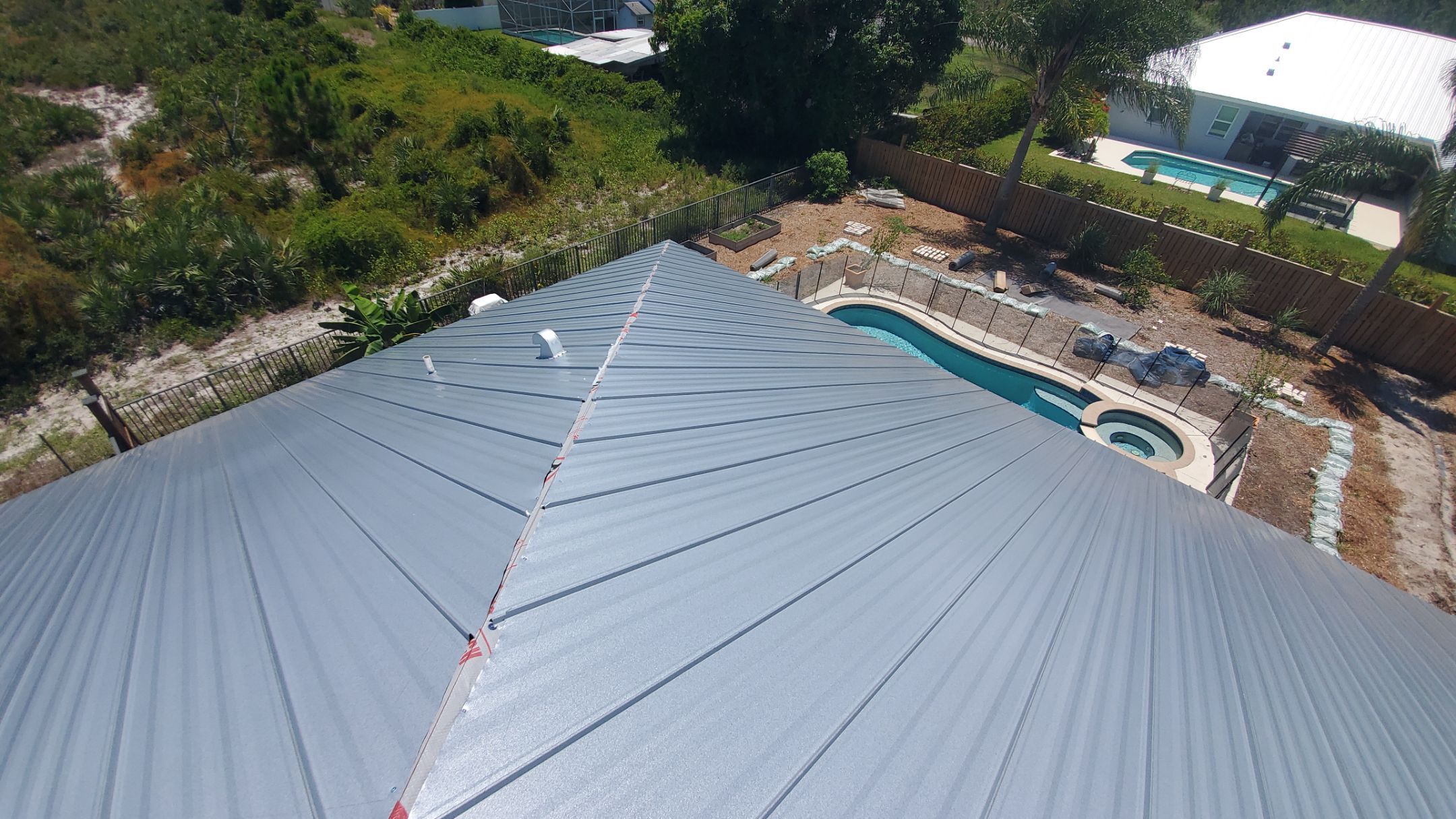 Standing Seam Metal Roof Replacement by Sailfish Roofing