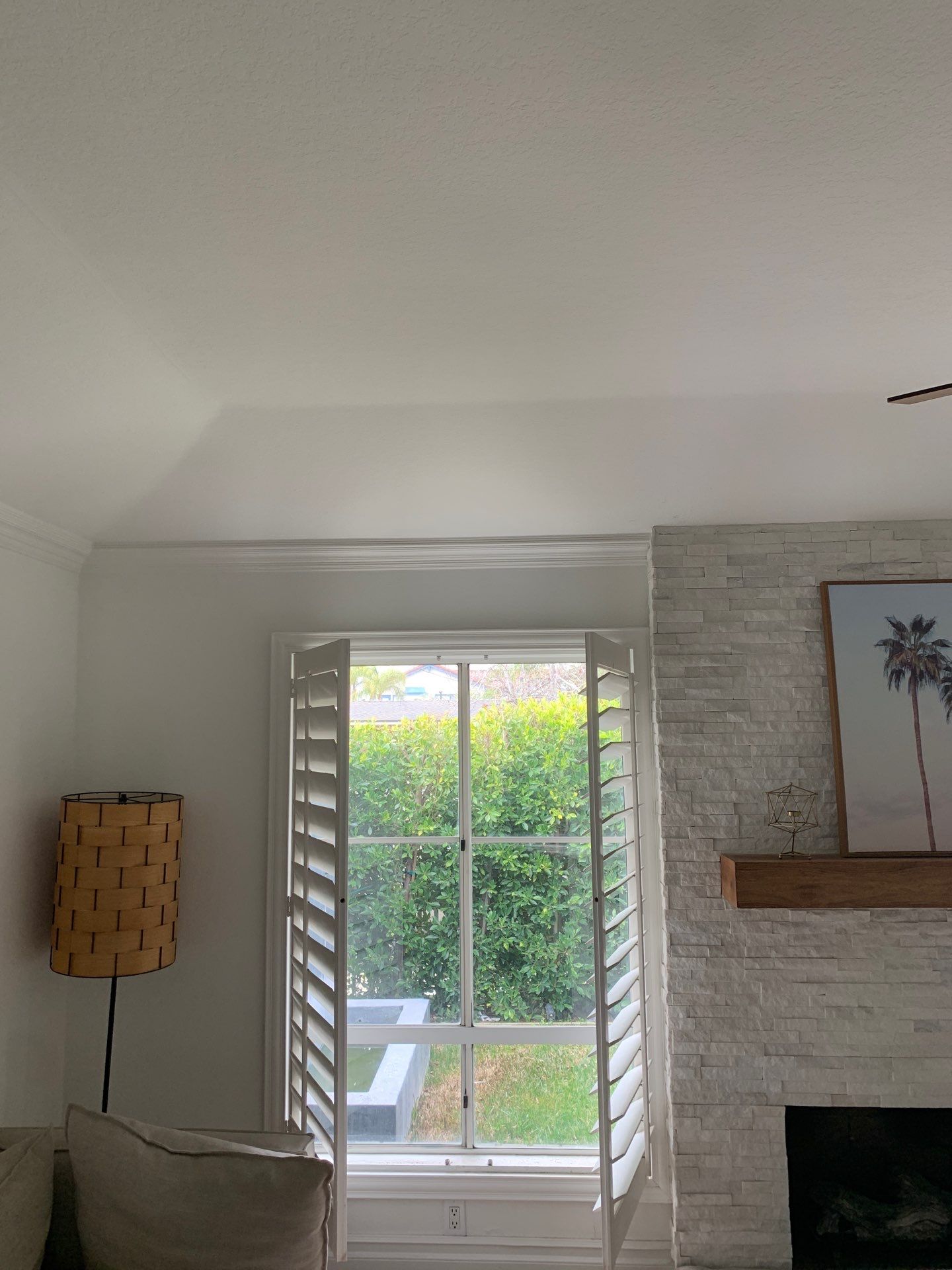 Window Installation using Milgard black vinyl windows by American Window Company