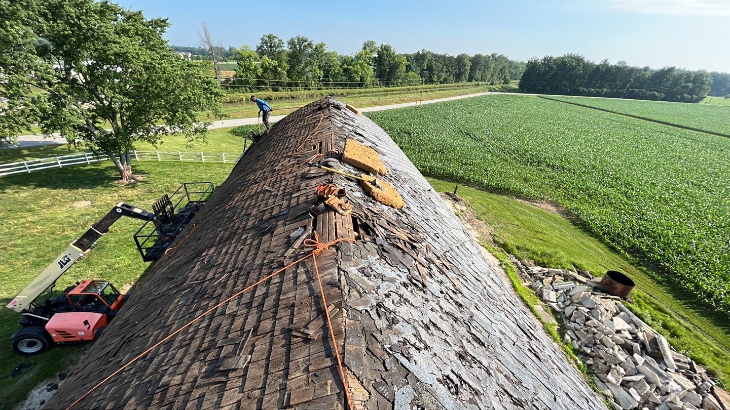 Barn Roofing Installation using GAF Timberline HDZ Charcoal by Nitro Roofing and Construction