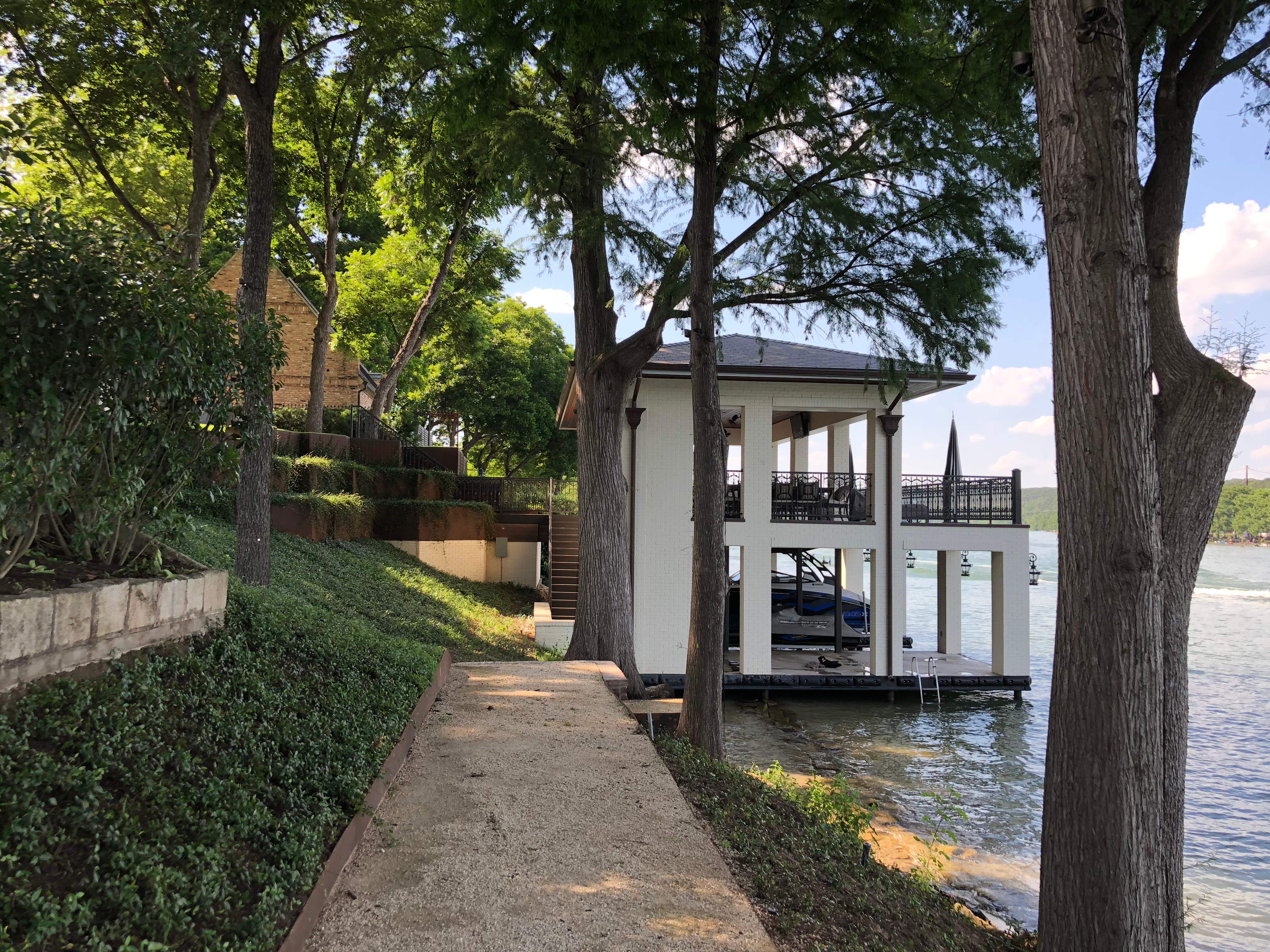 Austin Boat Dock + Outdoor Landscape Lighting by Outdoor Lights + Shades