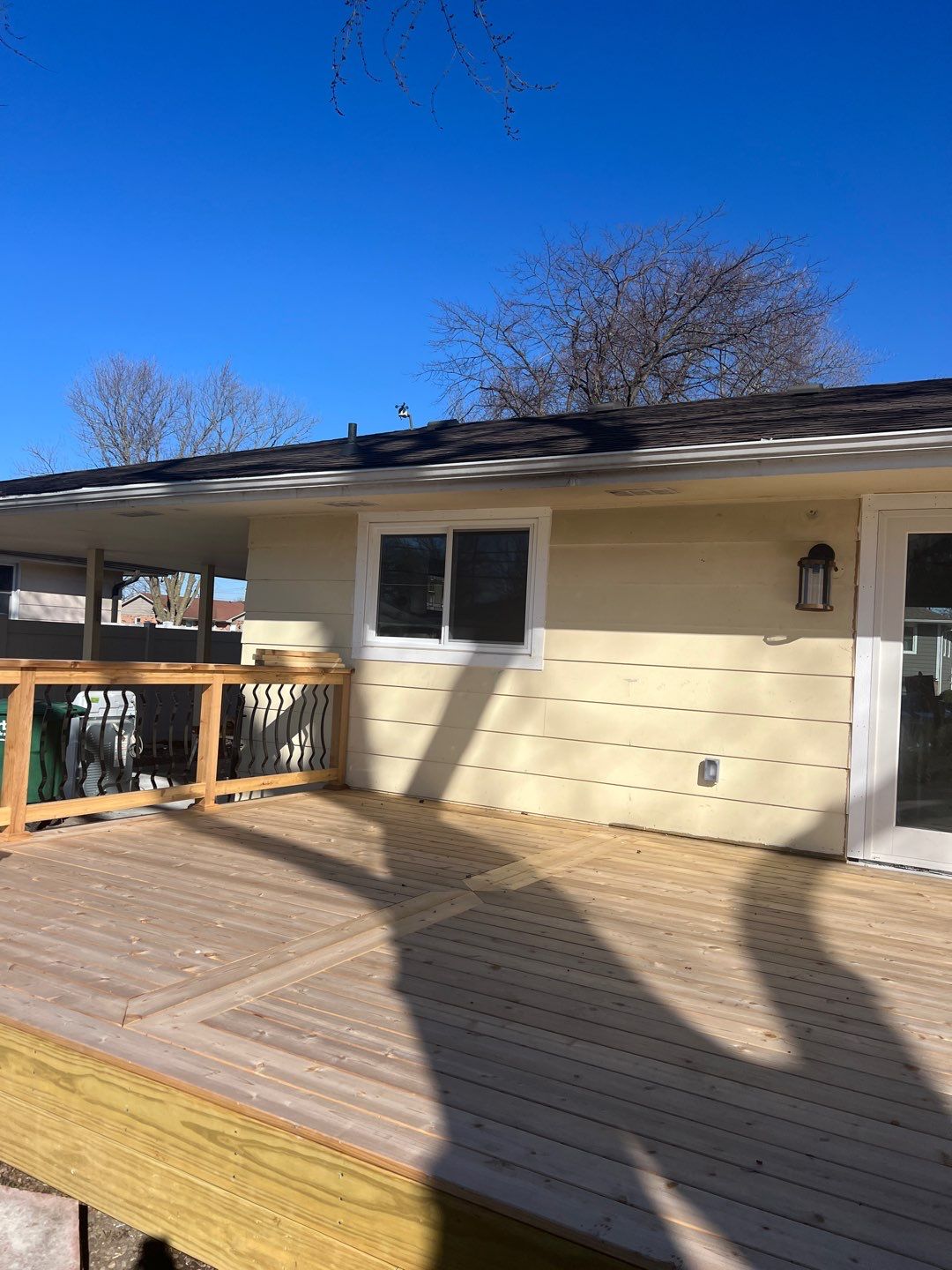 Deck re stained  by Cutting edge painting 