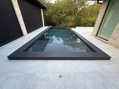 Modern Geometric Pool with Dark Interior Finish