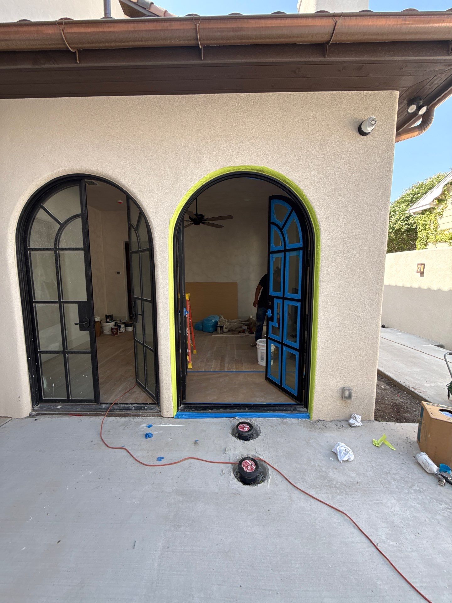 Arched Black Metal French Door Installation and Finishing in Fort Worth by Solara Custom Living