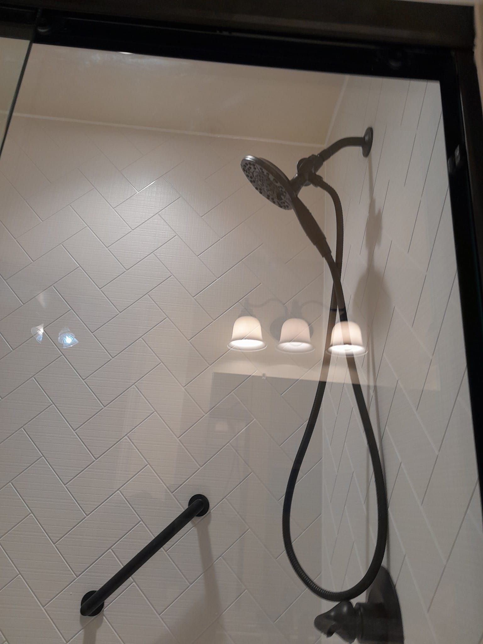 Shower remodel using Maintenance free wall system and shower pan with glass door by Window Depot of Annapolis