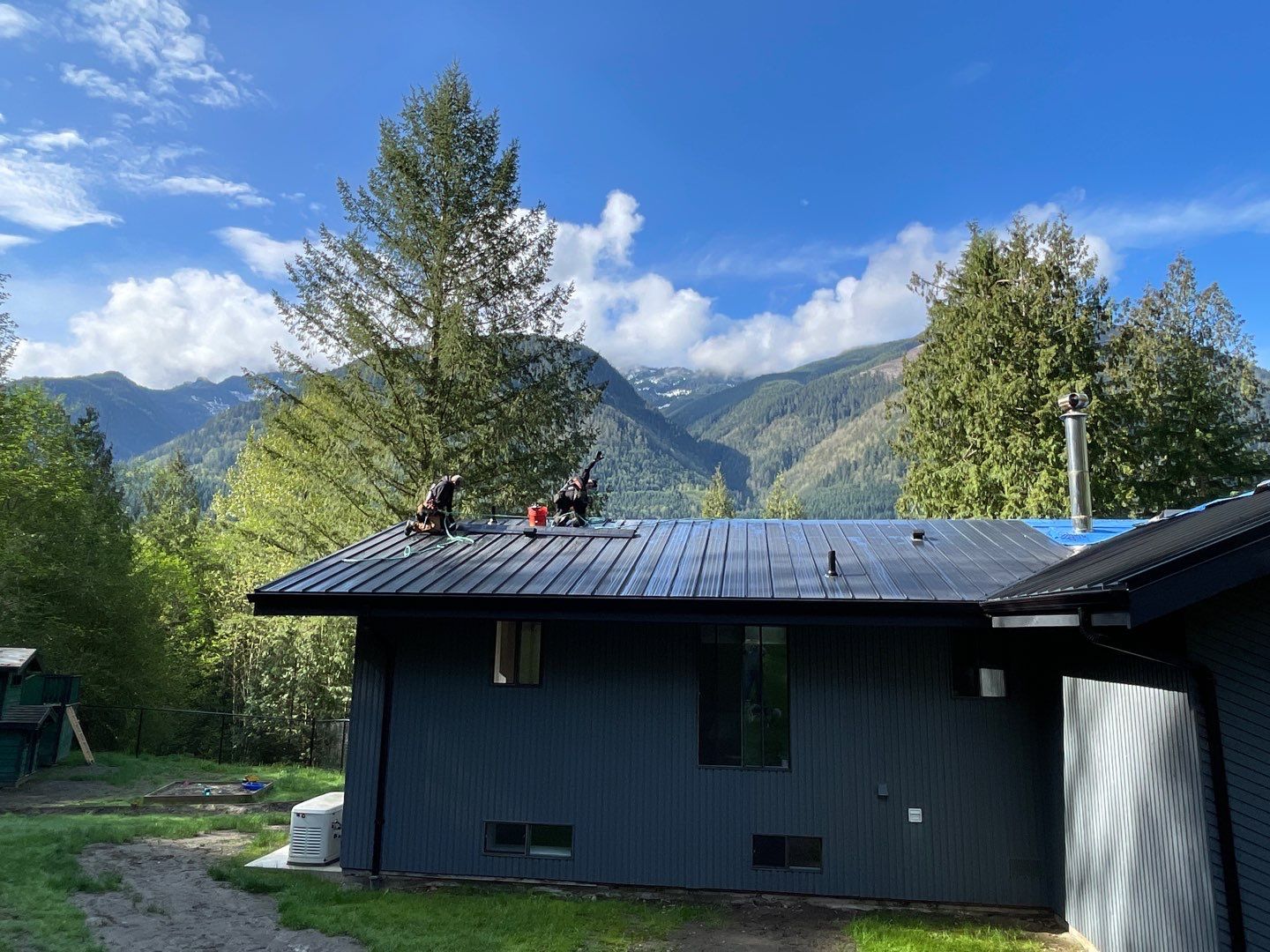 Residential ReRoofing Installation using 12" Prolok metal by Top Notch Roofing Inc