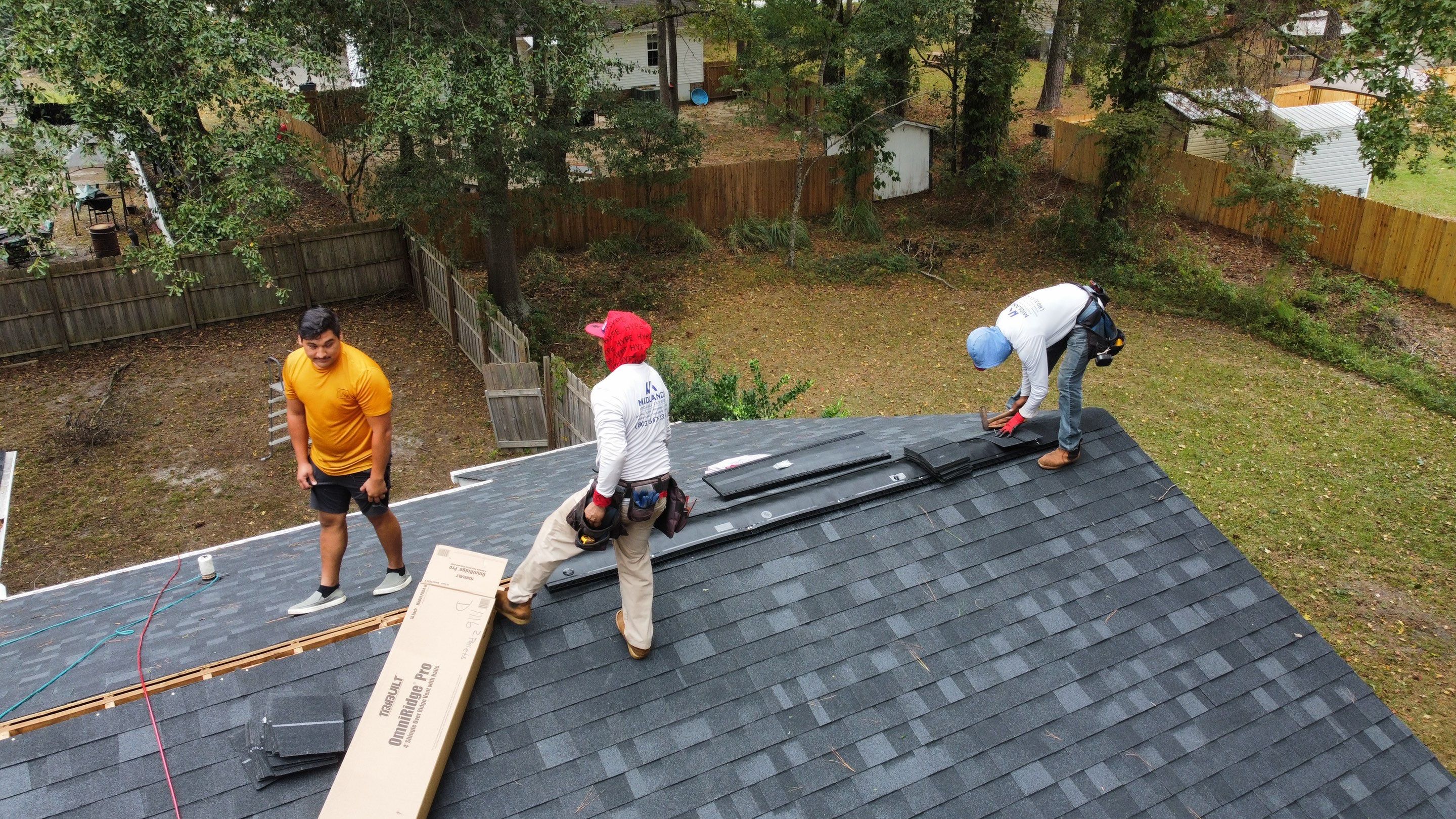 New Onyx Black Shingle Roof Replacement and Tree Damage Repair. by Midlands Roofing & Exteriors