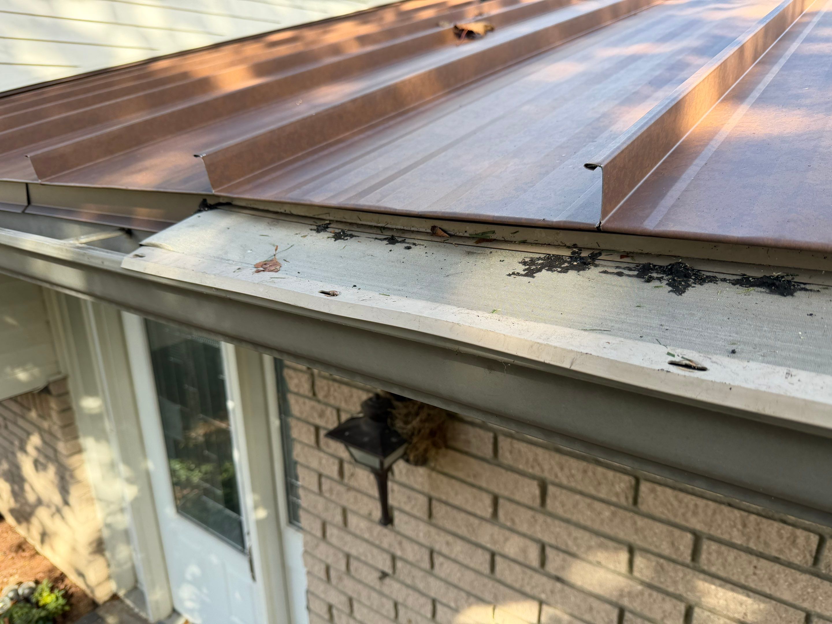 Roof Replacement using MS Standing Seam Roof Western Rust by 180 Contractors