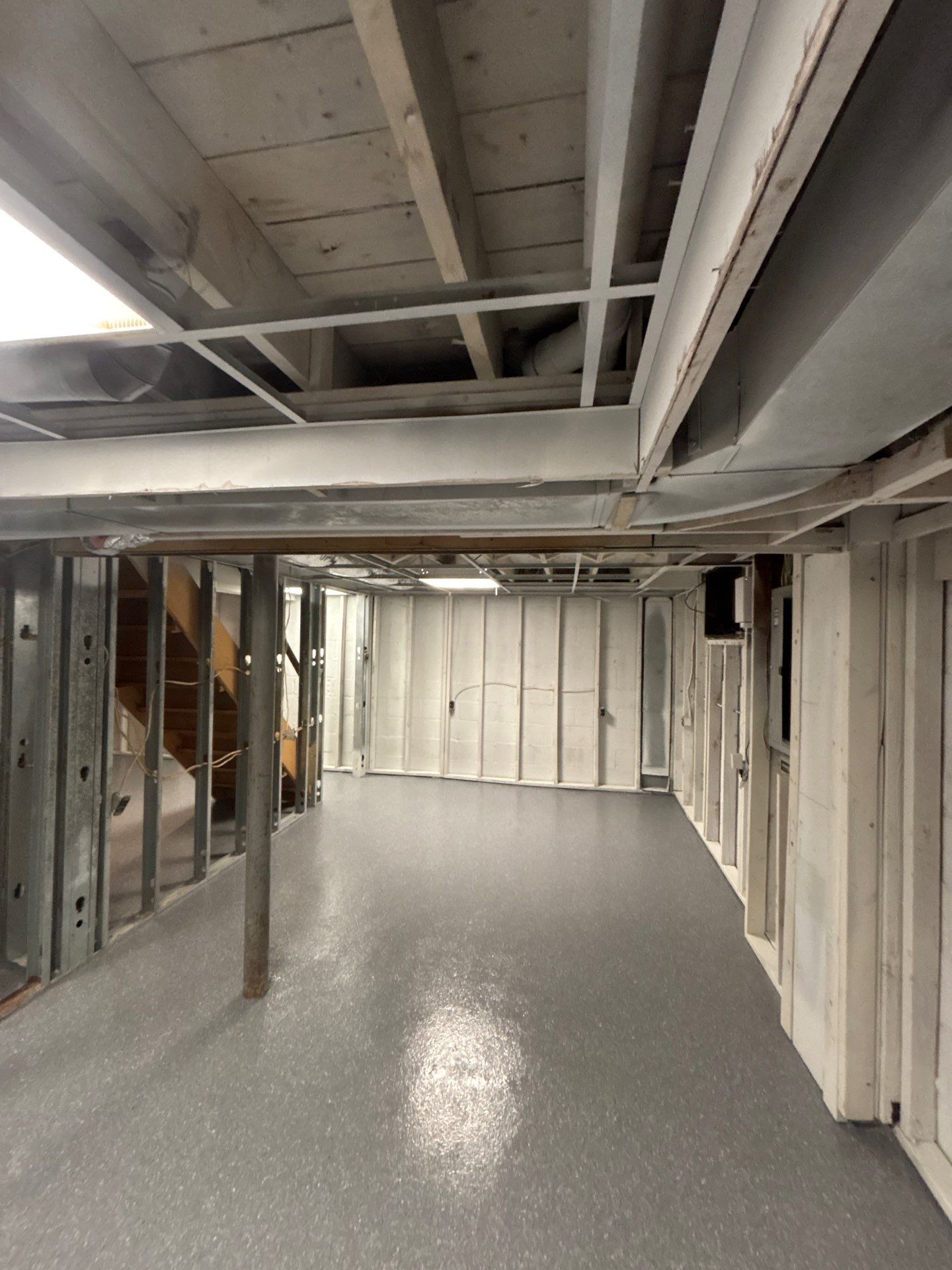 Basement Concrete Floor Coating with Penntek Flake System by Spectrum Painting, LLC