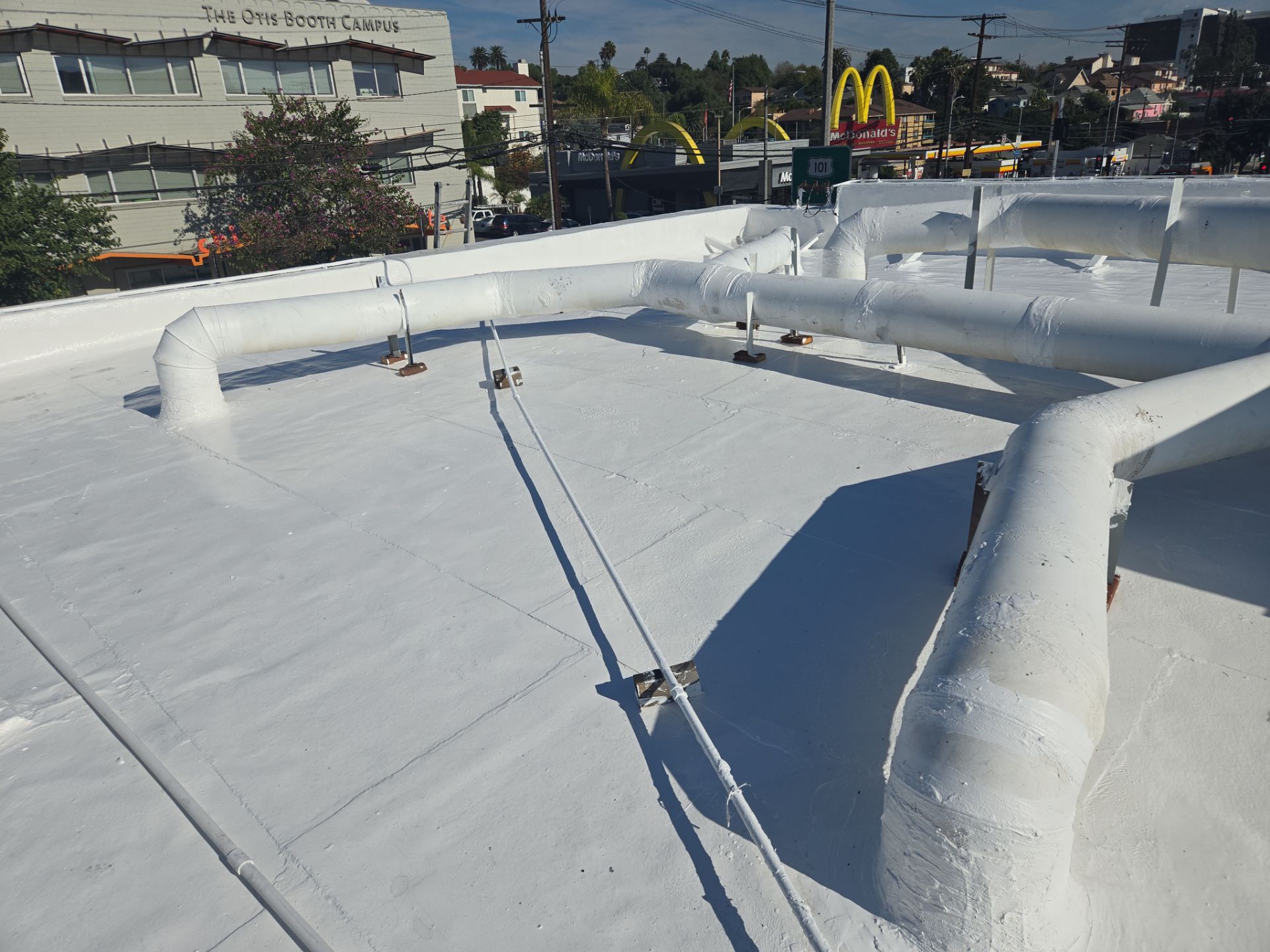 Commercial Roofing Installation using ASC Silicone Membrane by Hull Brothers Roofing
