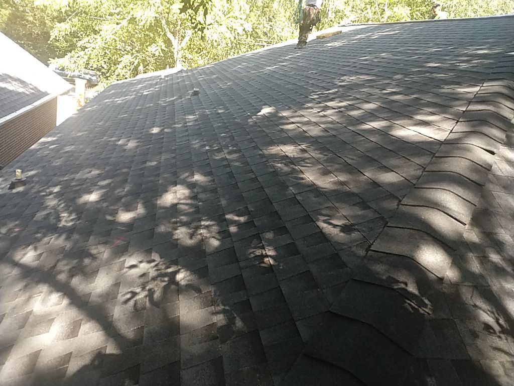 Residential Roofing Installation using Roof Replacement by American Roofing & Construction LLC