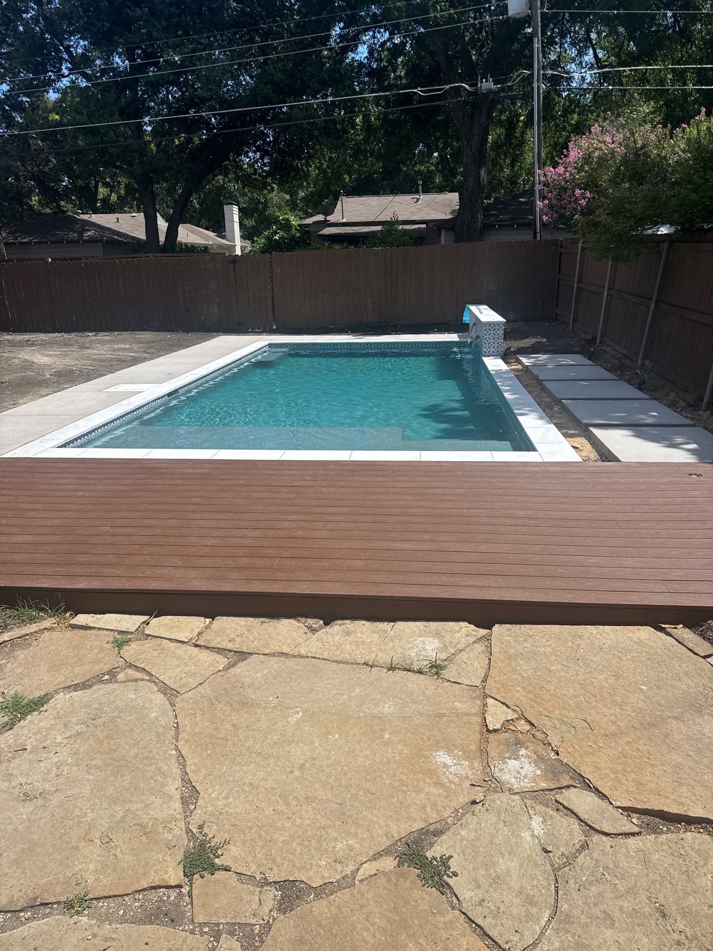 Modern Plunge Pool with Tiled Sheer-Descent Water Wall by Pinnacle Pools and Spas - DFW