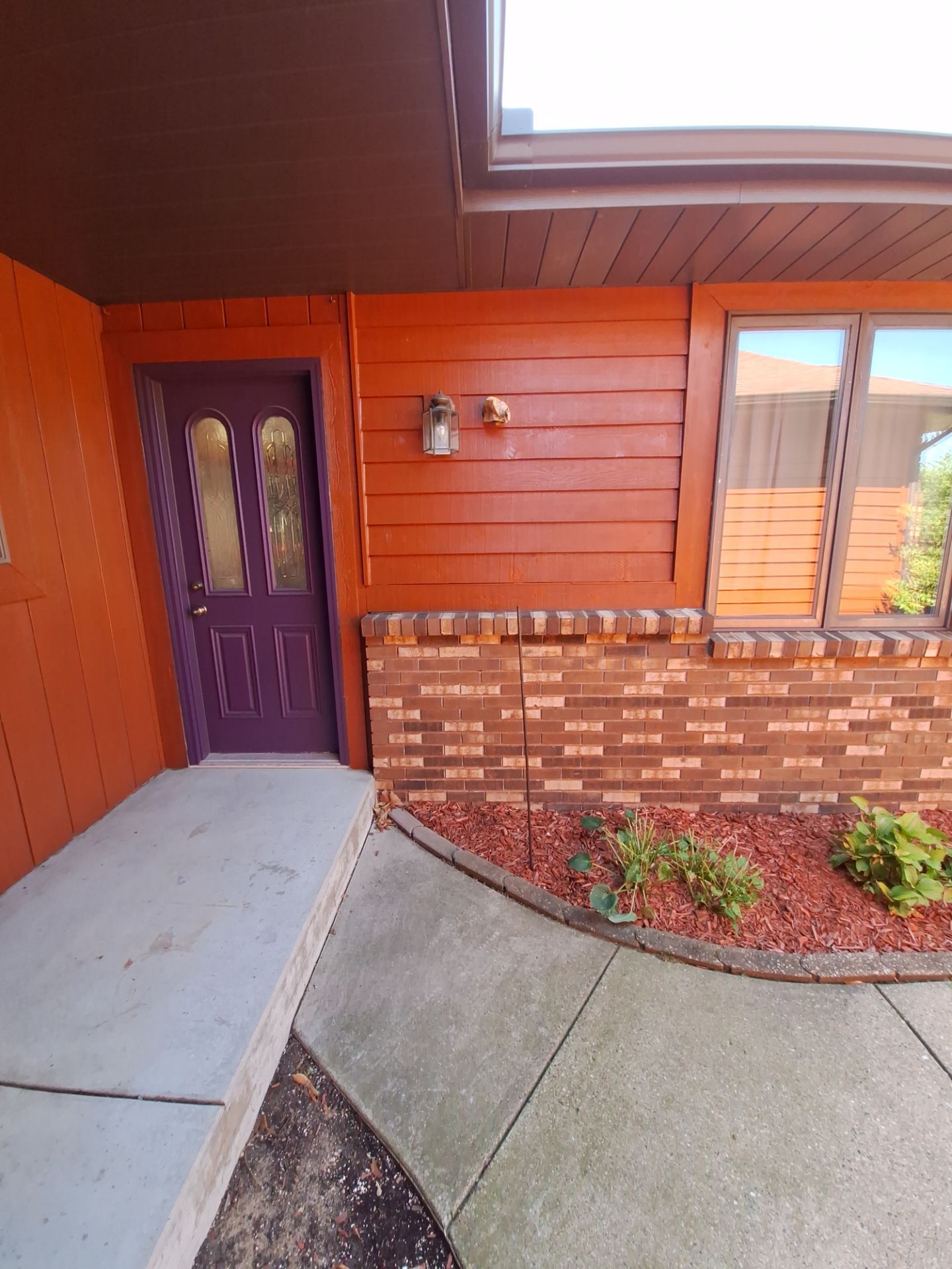 Front of home and garage staining by Gordon Painting