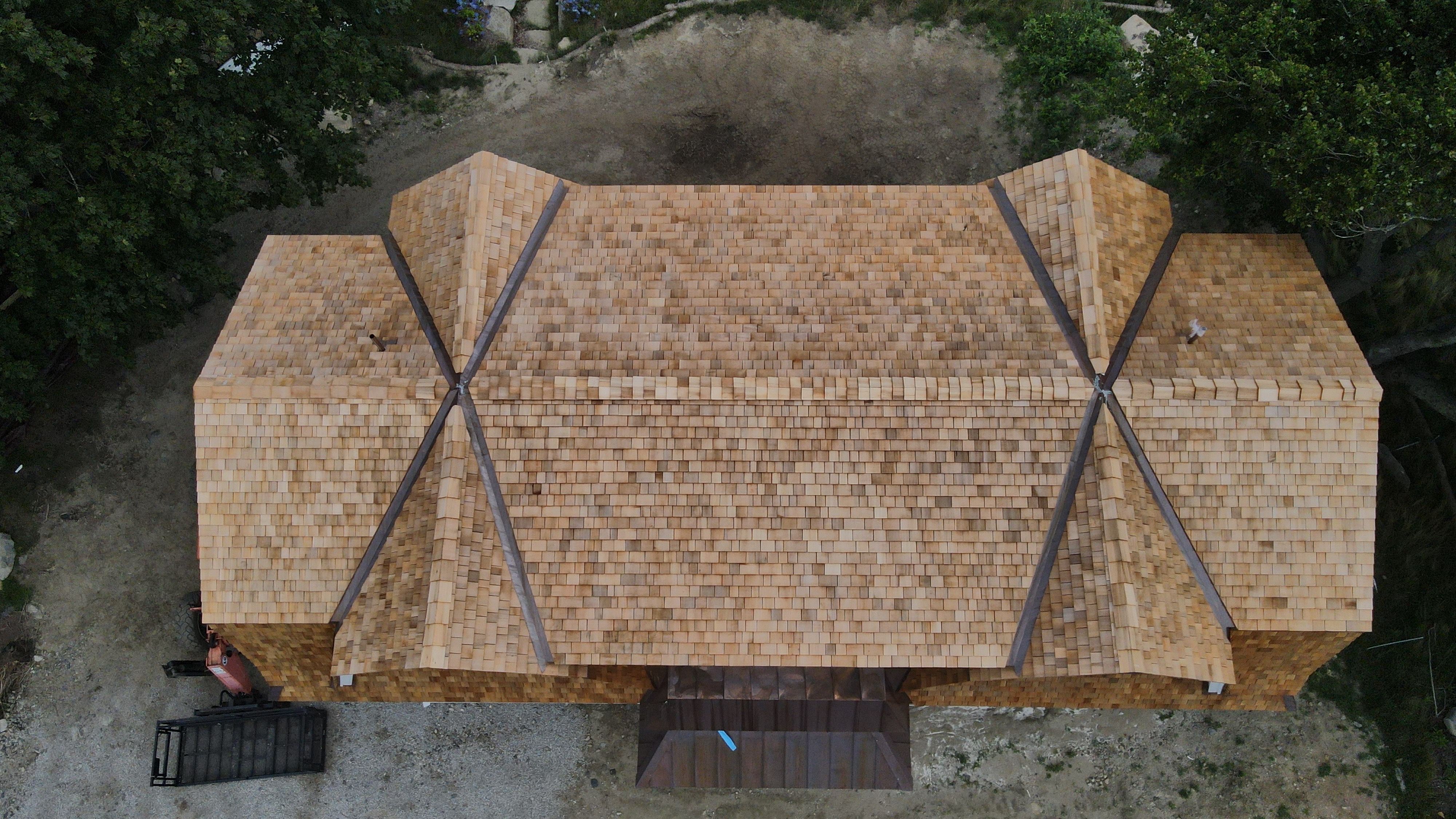 Great Island - Red Cedar Roofing, Yellow Cedar Siding, Standing Seam Copper, & Copper Gutters  by Rinaldi Brothers