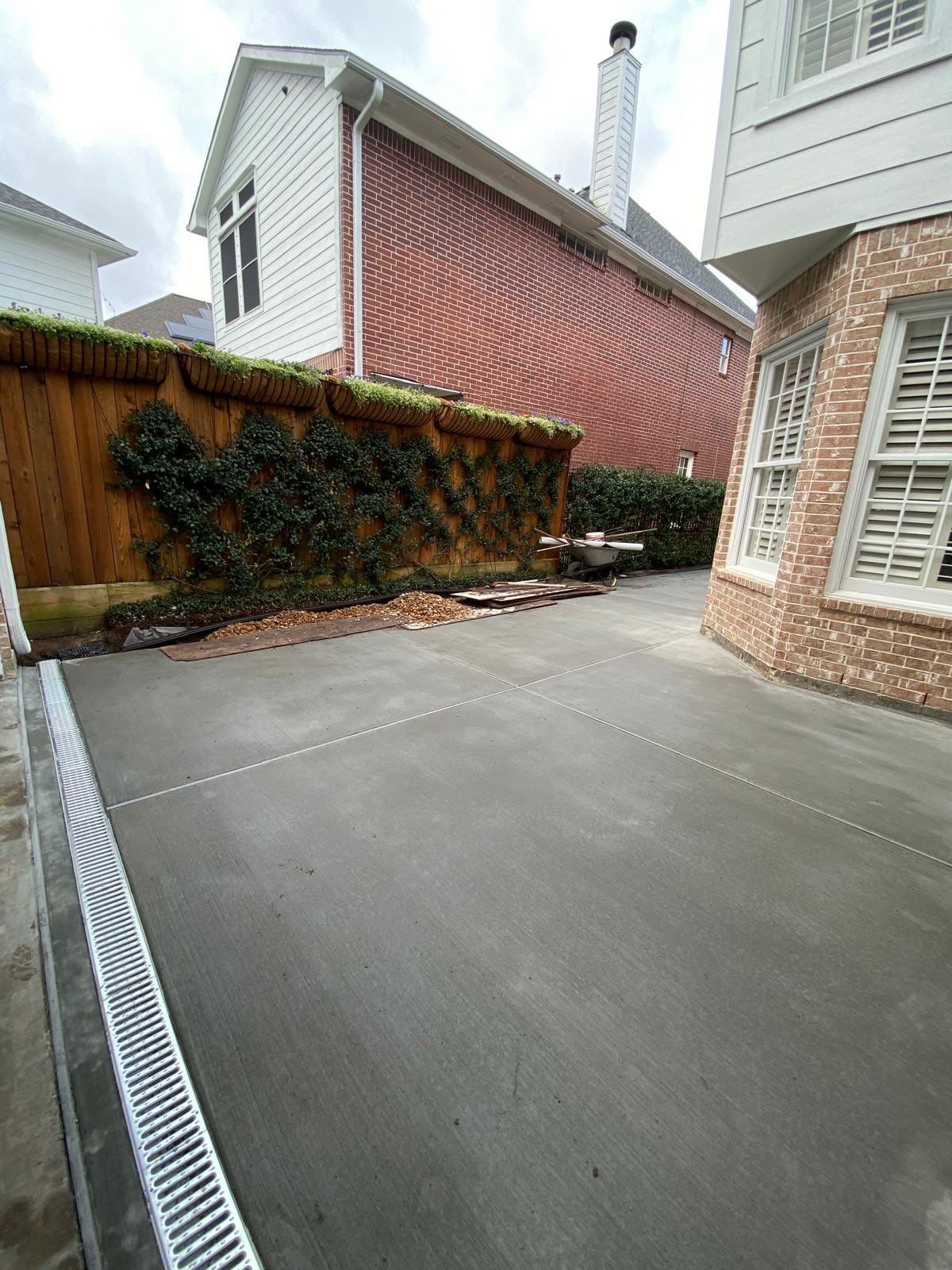 Driveway Concrete Replacement & French Drainage System by Texas Urban Elements