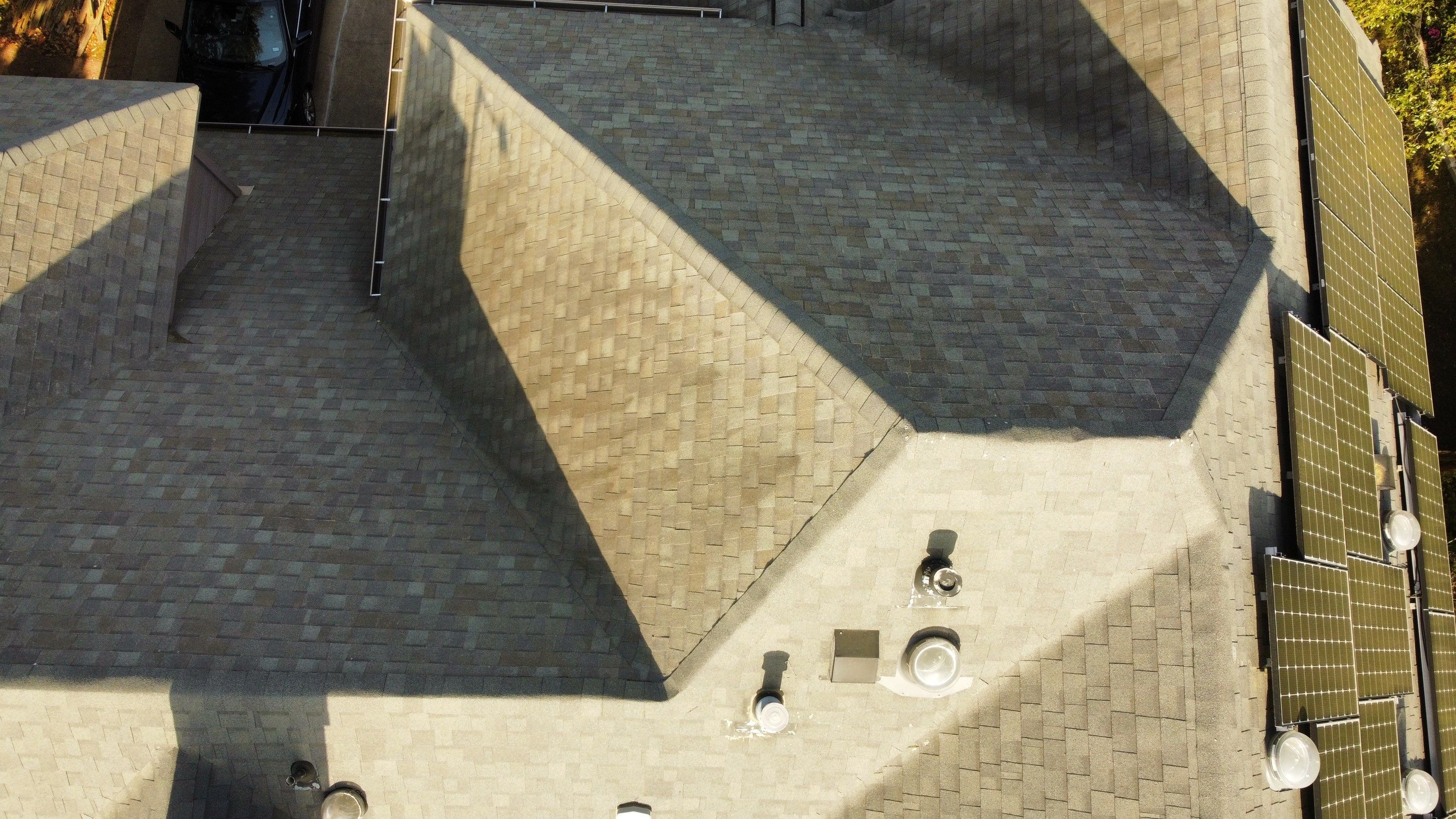 Residential Roof Replacement and Solar Panel Integration in Austin by Caliber Restoration LLC
