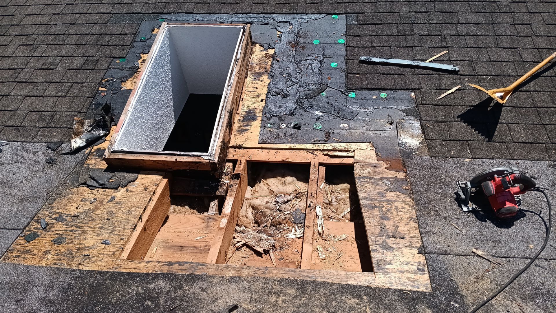 REPLACE NON APPROVED SKYLIGHT ALONG WITH CLOGED GUTTER by Morton Roofing, Inc.