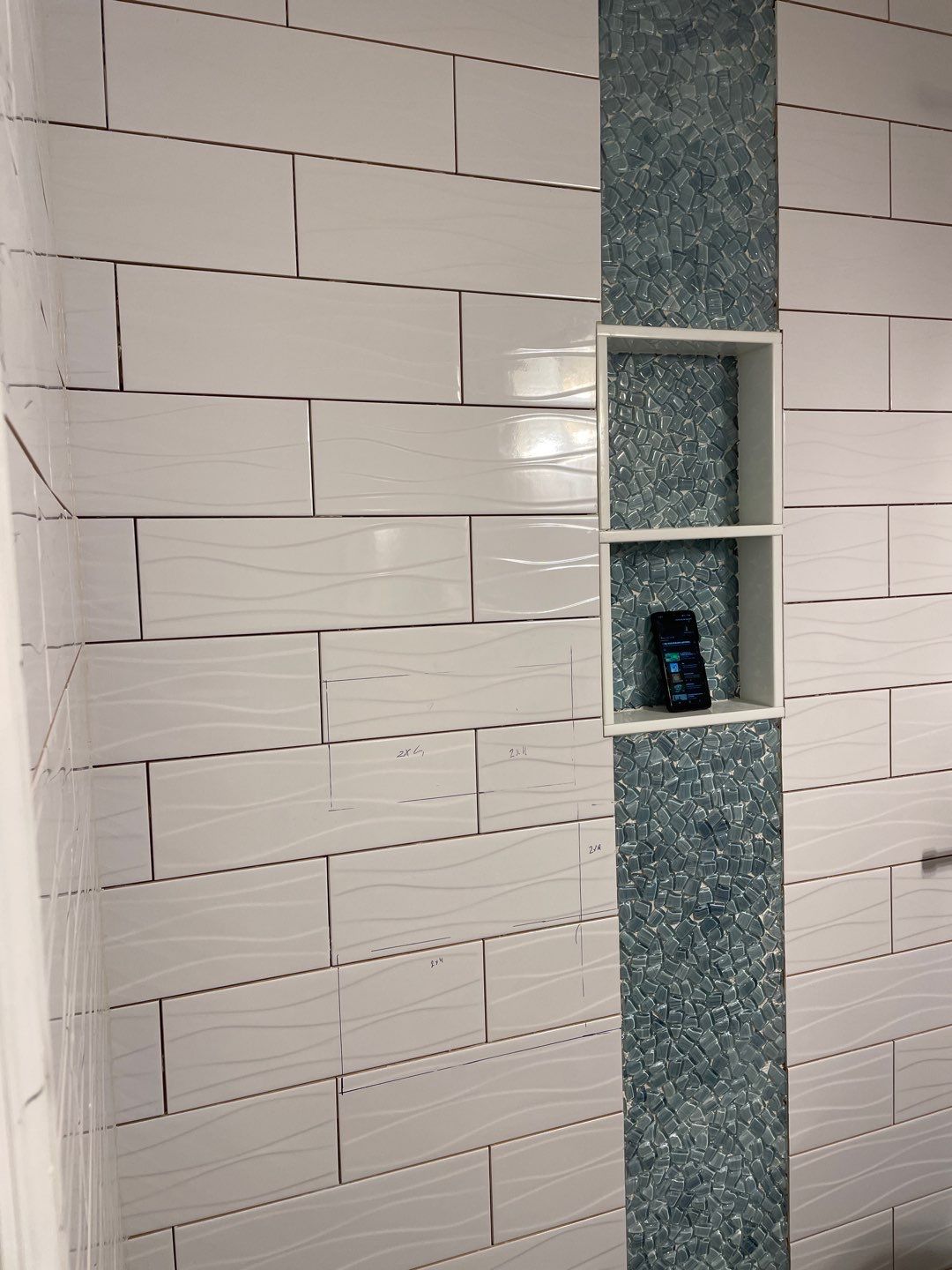 Sleek bathroom shower remodel by Footprints Floors of East Atlanta