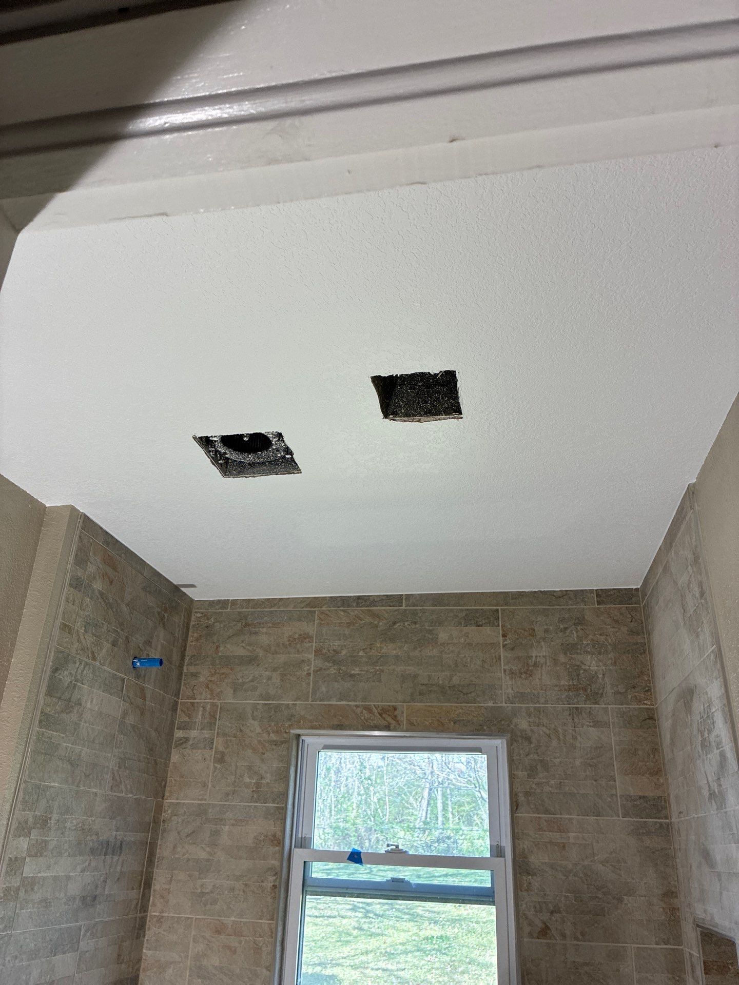 Beautiful Bathroom Remodel by In & Out Construction & Remodeling, LLC