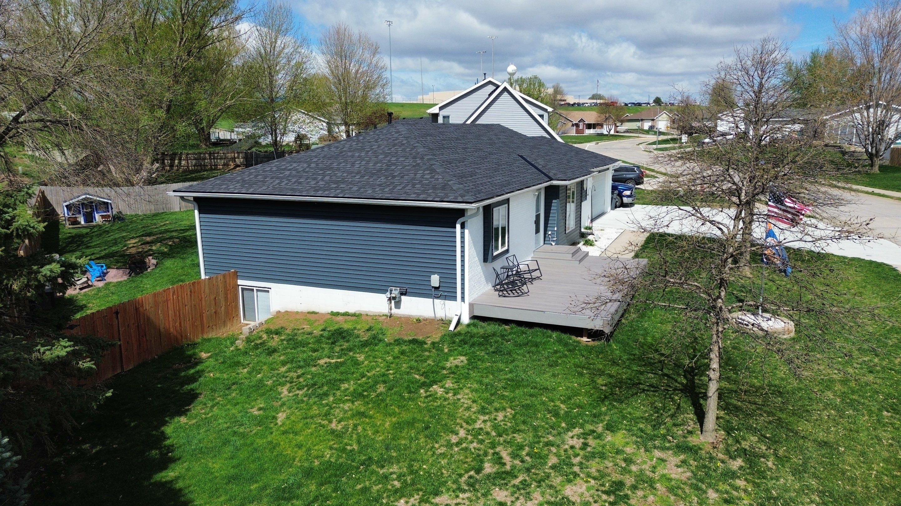 Roofing / Siding / Gutters using IKO Dynasty Granite Black / Norandex Siding by Lightning Exteriors