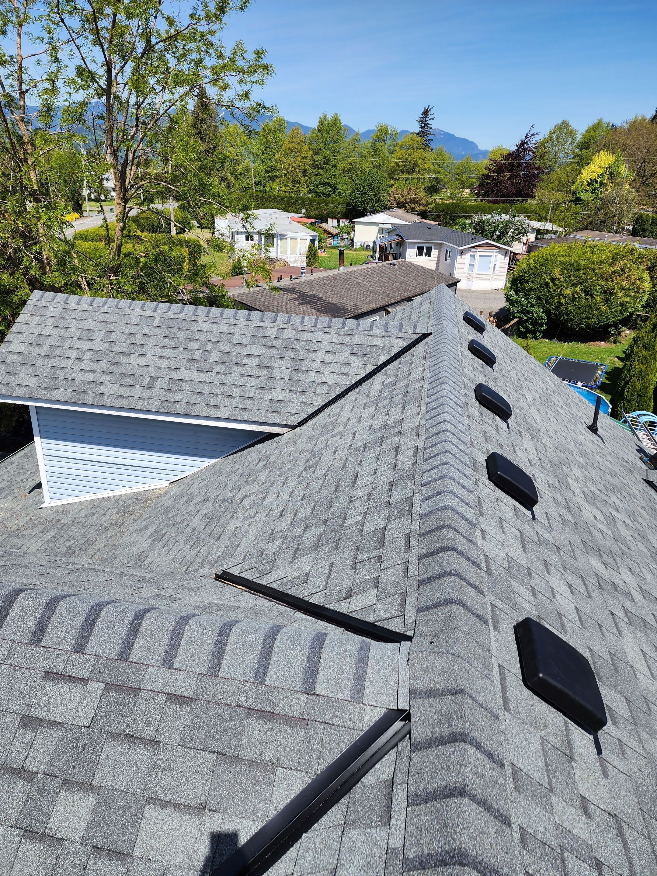 Residential Roofing Installation using Estate Gray Shingles by Top Notch Roofing Inc