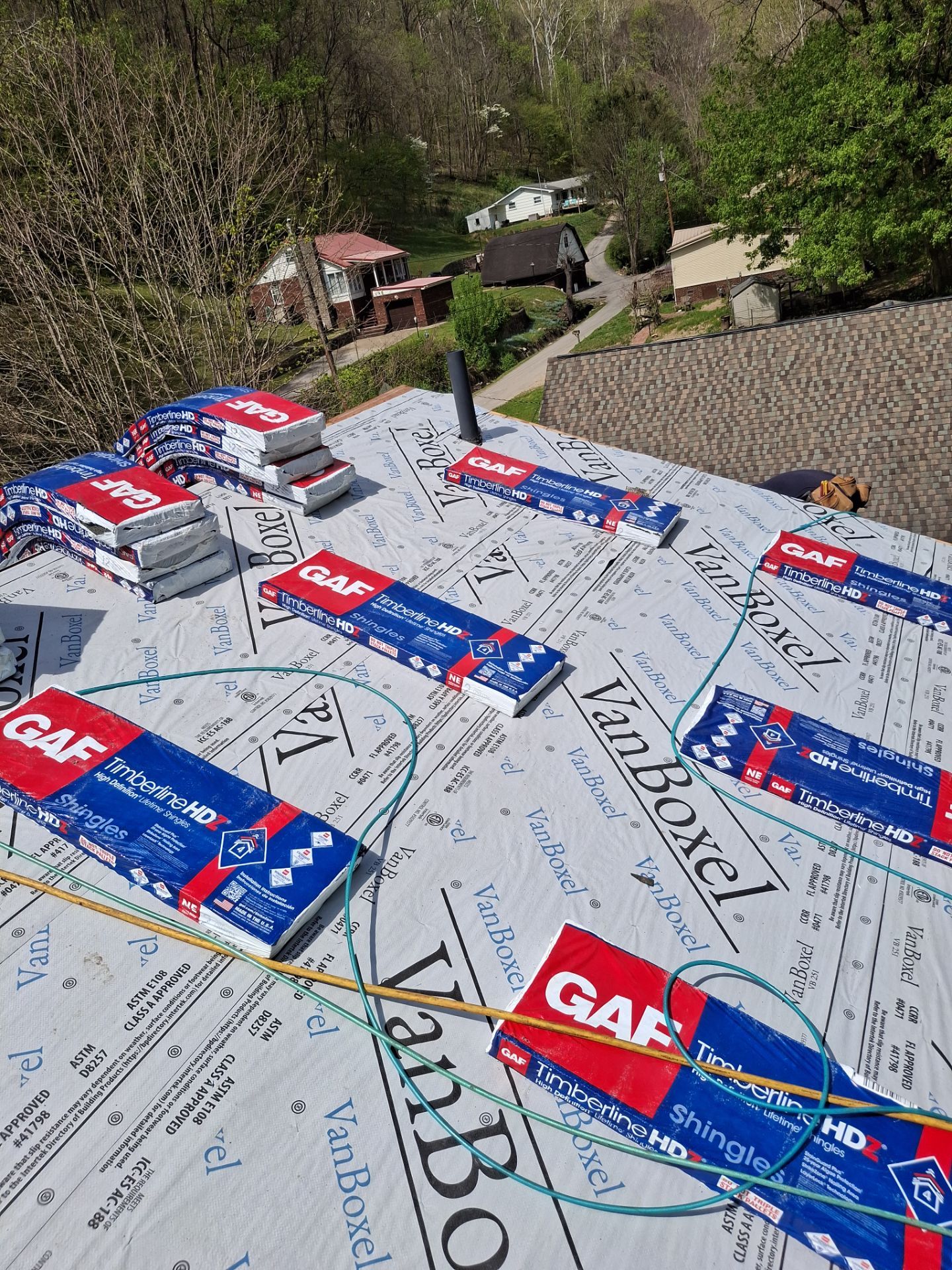 Residential Roofing Installation using GAF Timberline HDZ Charcoal by Rainstoppers Roofing