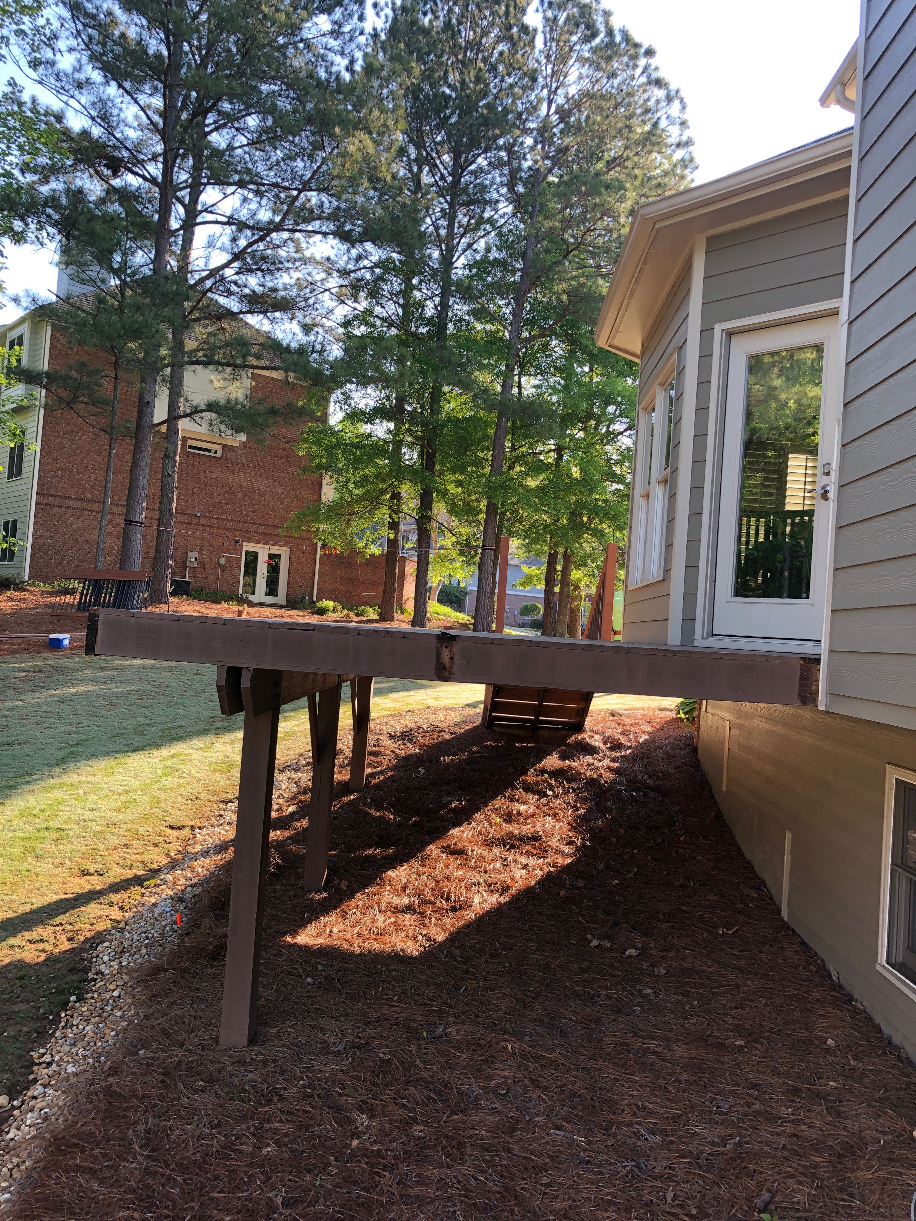 Covered Porch and Composite Deck Addition in Woodstock by Swift Home Renovations