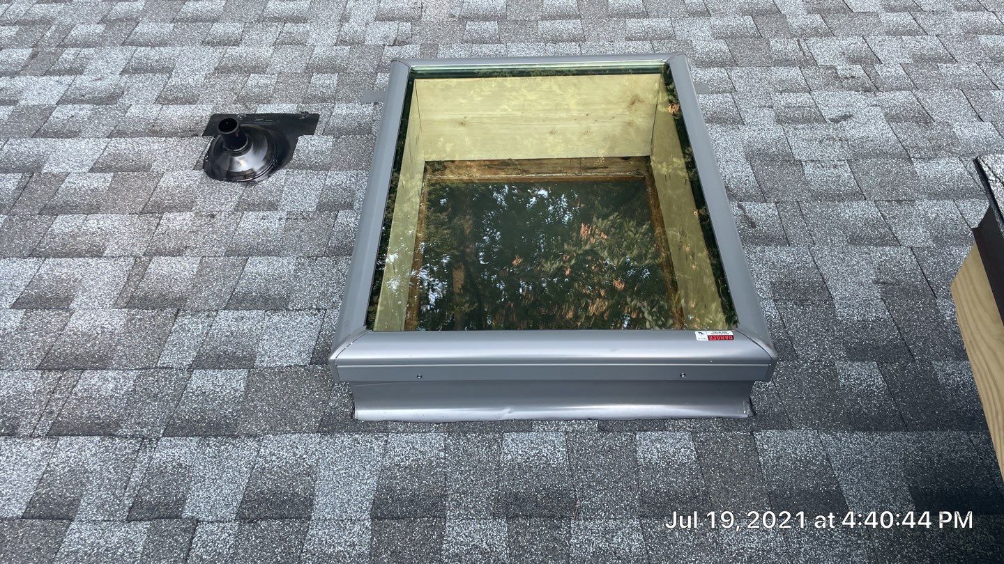 Deckhouse Roof Replacement by American Home Contractors