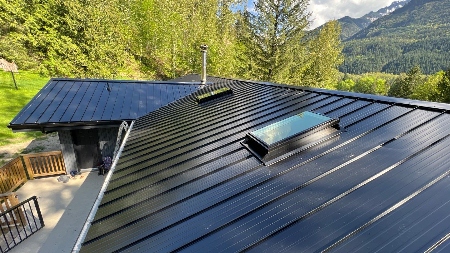 Residential ReRoofing Installation using 12" Prolok metal by Top Notch Roofing Inc