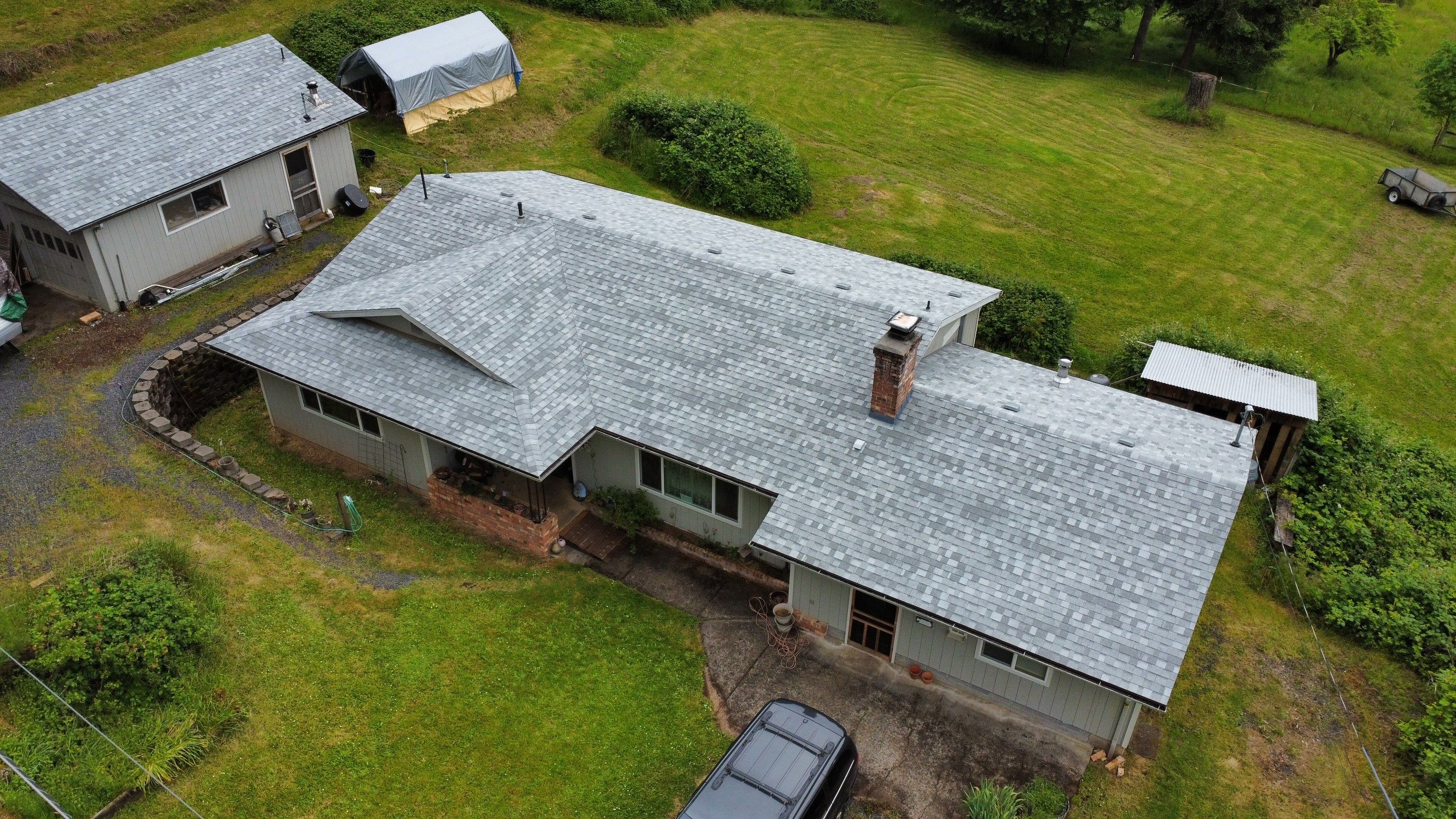 Residential Roofing Installation using IKO Dynasty (Color: Frostone Grey) by Orezona Building & Roofing Company, Inc.