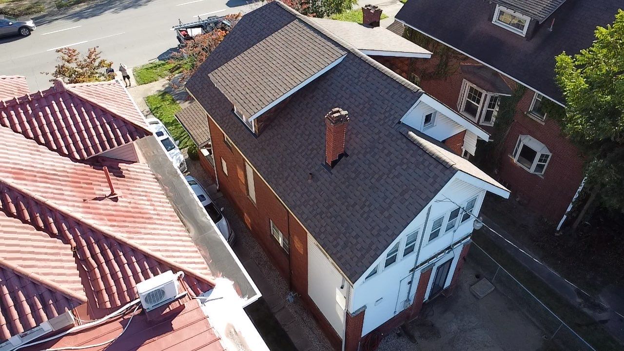 Adkins Project  by Fahey Roofing + Contracting