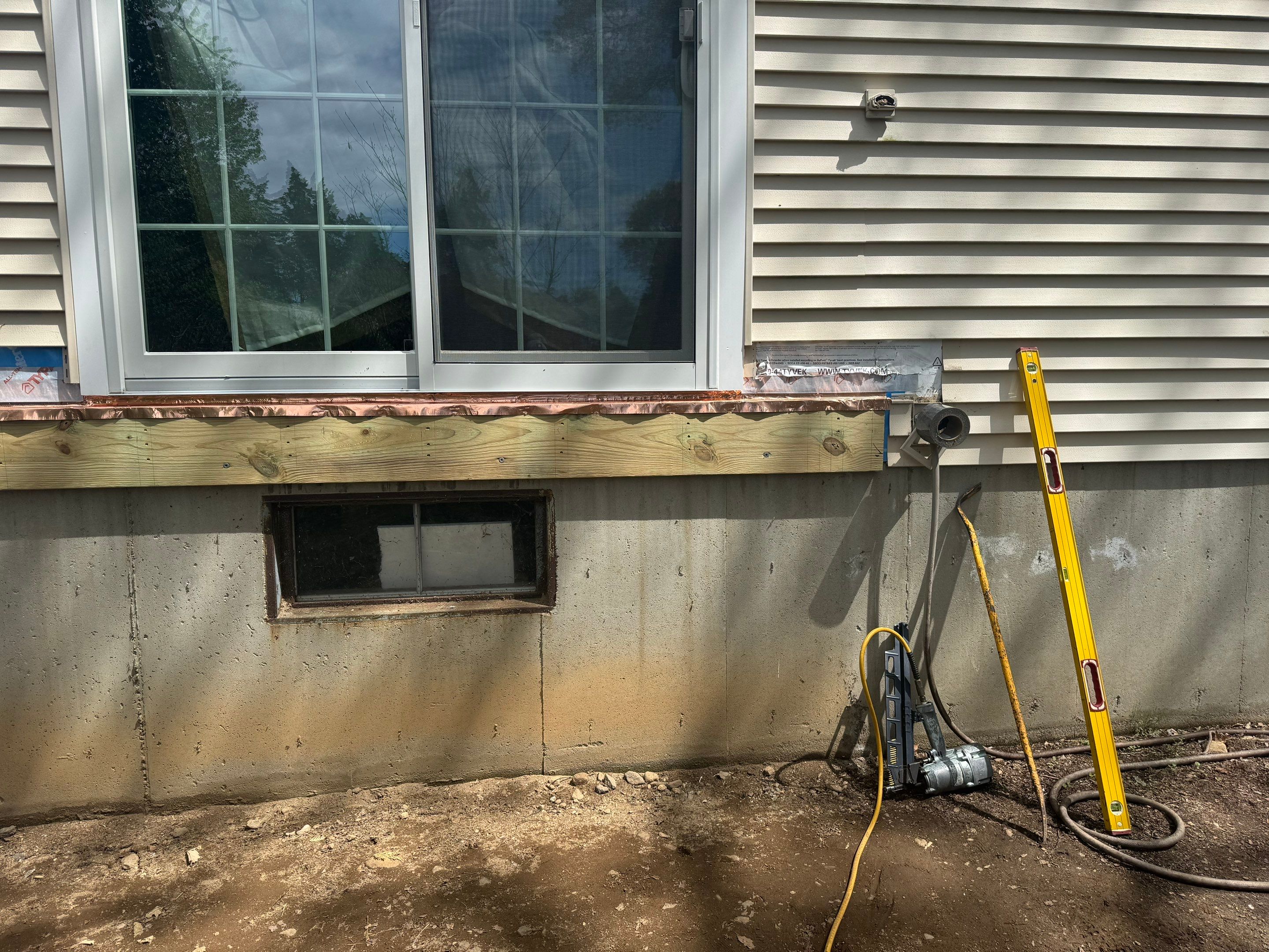 Deck replacement using Trex Transcend Rope Swing and Matching Rope Swing Transcend railing by DiGiorgi Roofing and Siding Inc