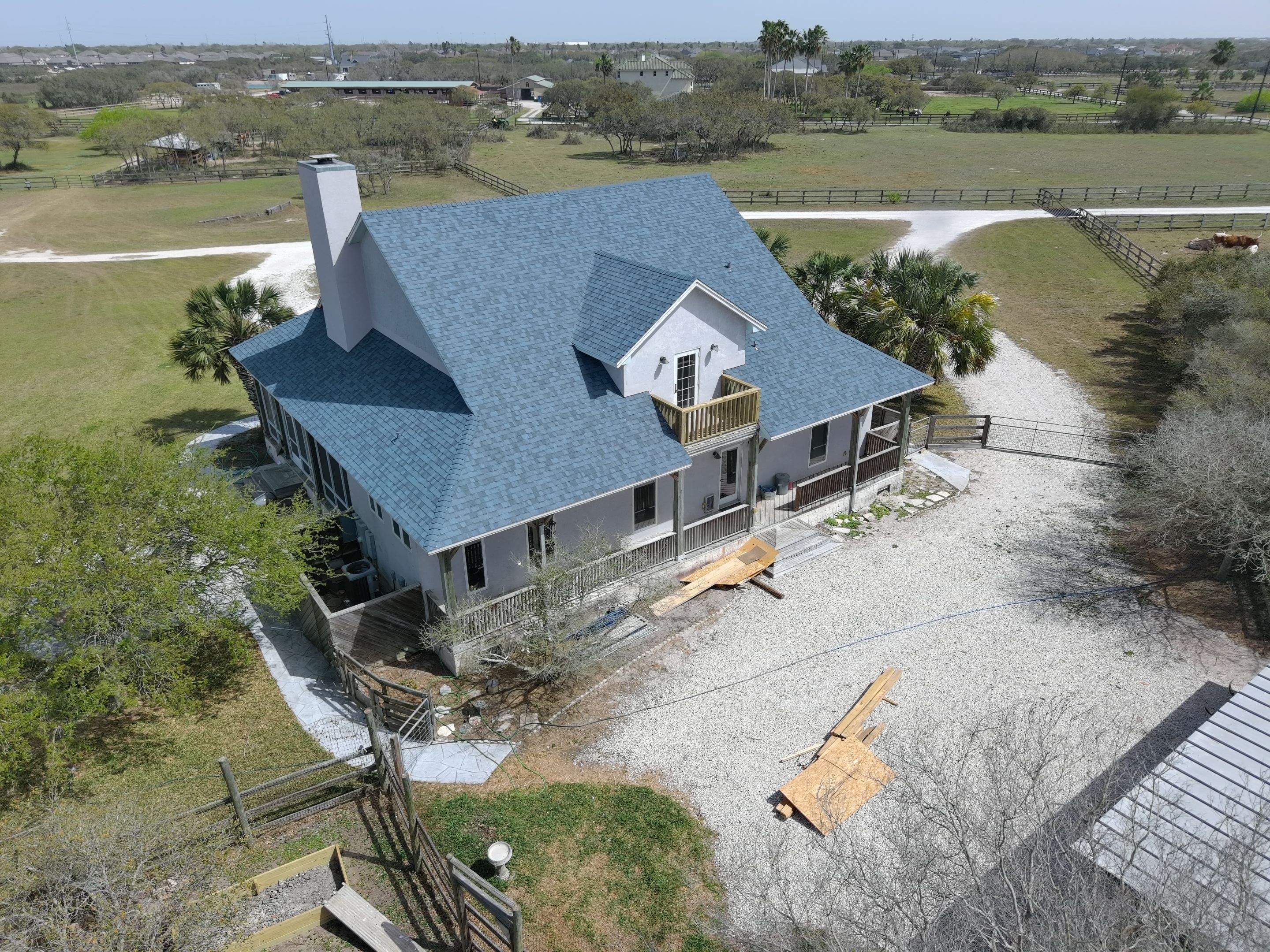 Long Horn Retreat by Bayfront Roofing and Construction