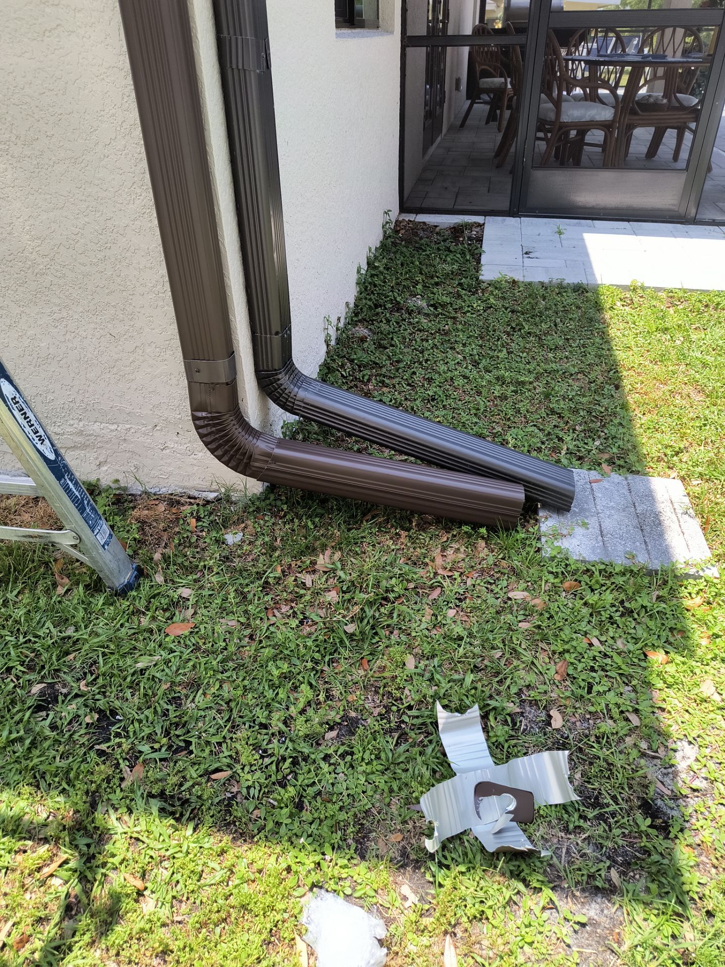 Custom Seamless Gutters and Downspouts for Large Homes in Tampa FL by Gutter Professor by Gutter Professors