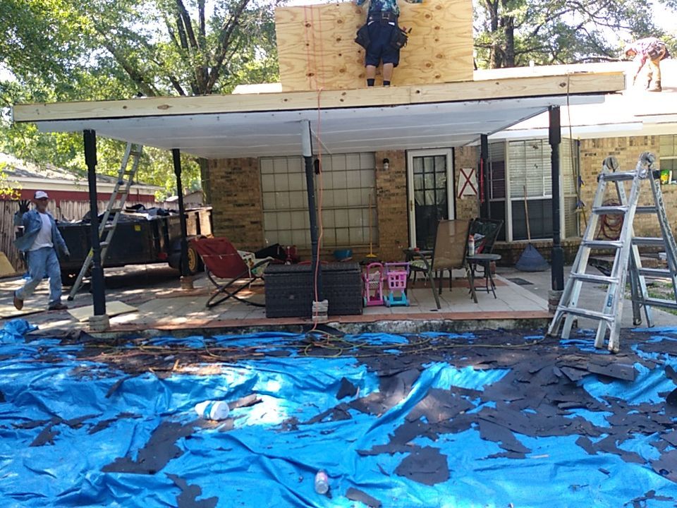 Residential Roofing Installation using Roof Replacement by American Roofing & Construction LLC