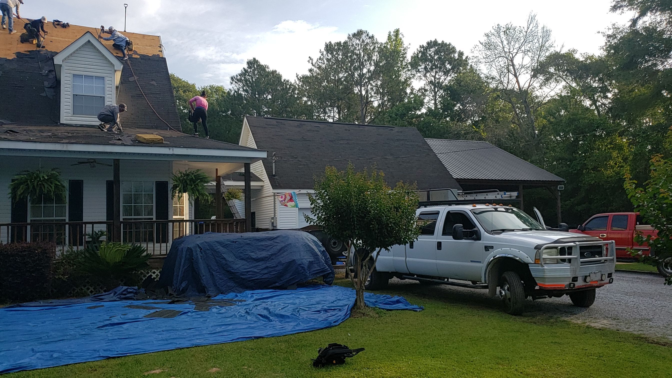 Residential Roofing Installation using Roof Replacement by American Roofing & Construction LLC