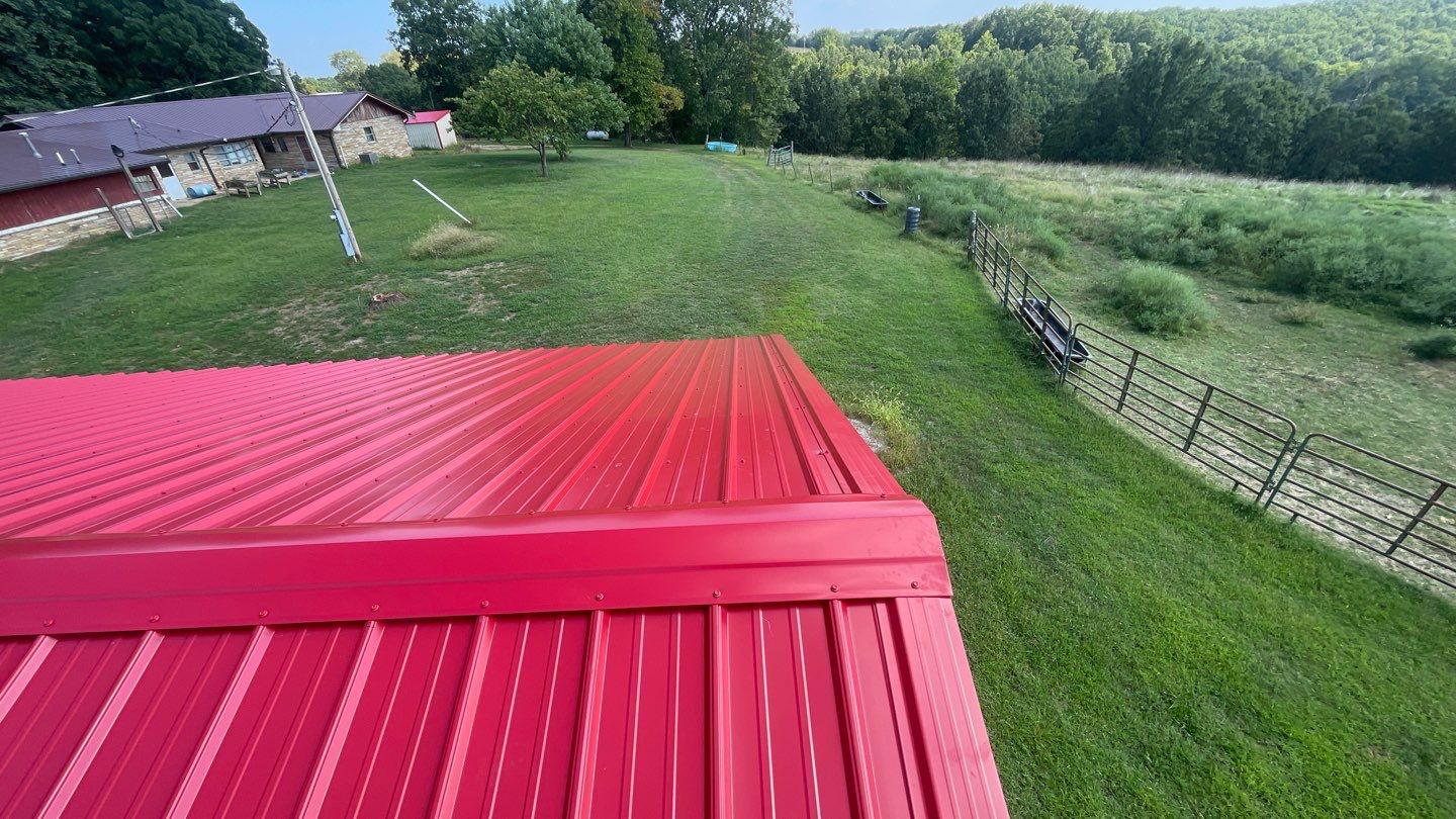 Residential Roofing Install - 29 Gauge G-Rib Metal - Color Brown & Crimson Red by Titan Commercial & Residential Roofing 