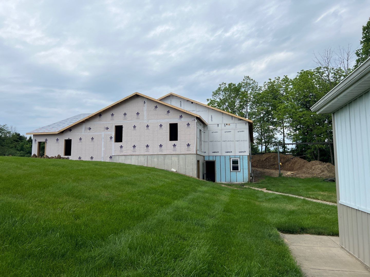 Commercial Roofing Installation using Standing Seam Metal - Burnished Slate Frost by RoofX 
