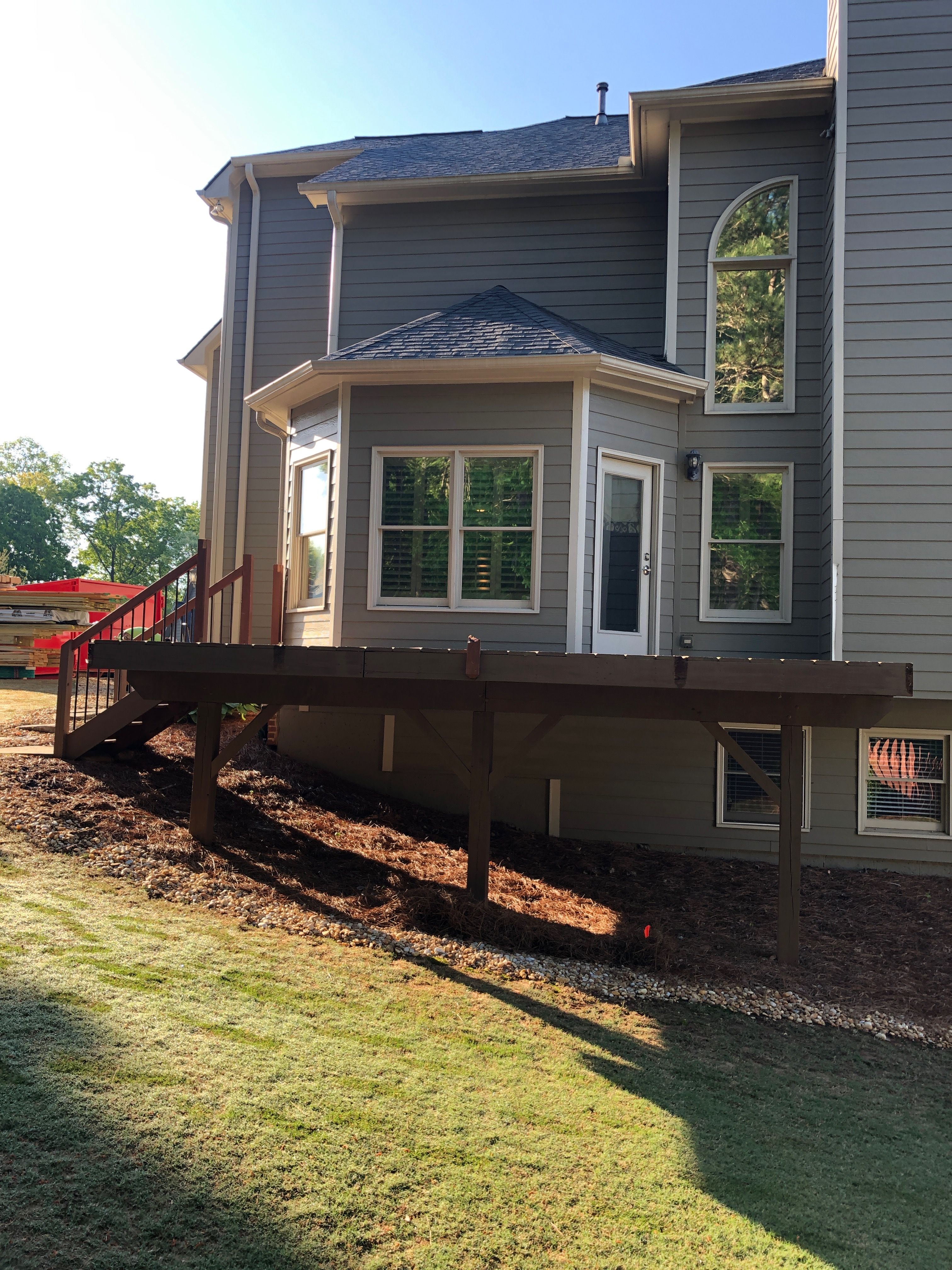 Covered Porch and Composite Deck Addition in Woodstock by Swift Home Renovations